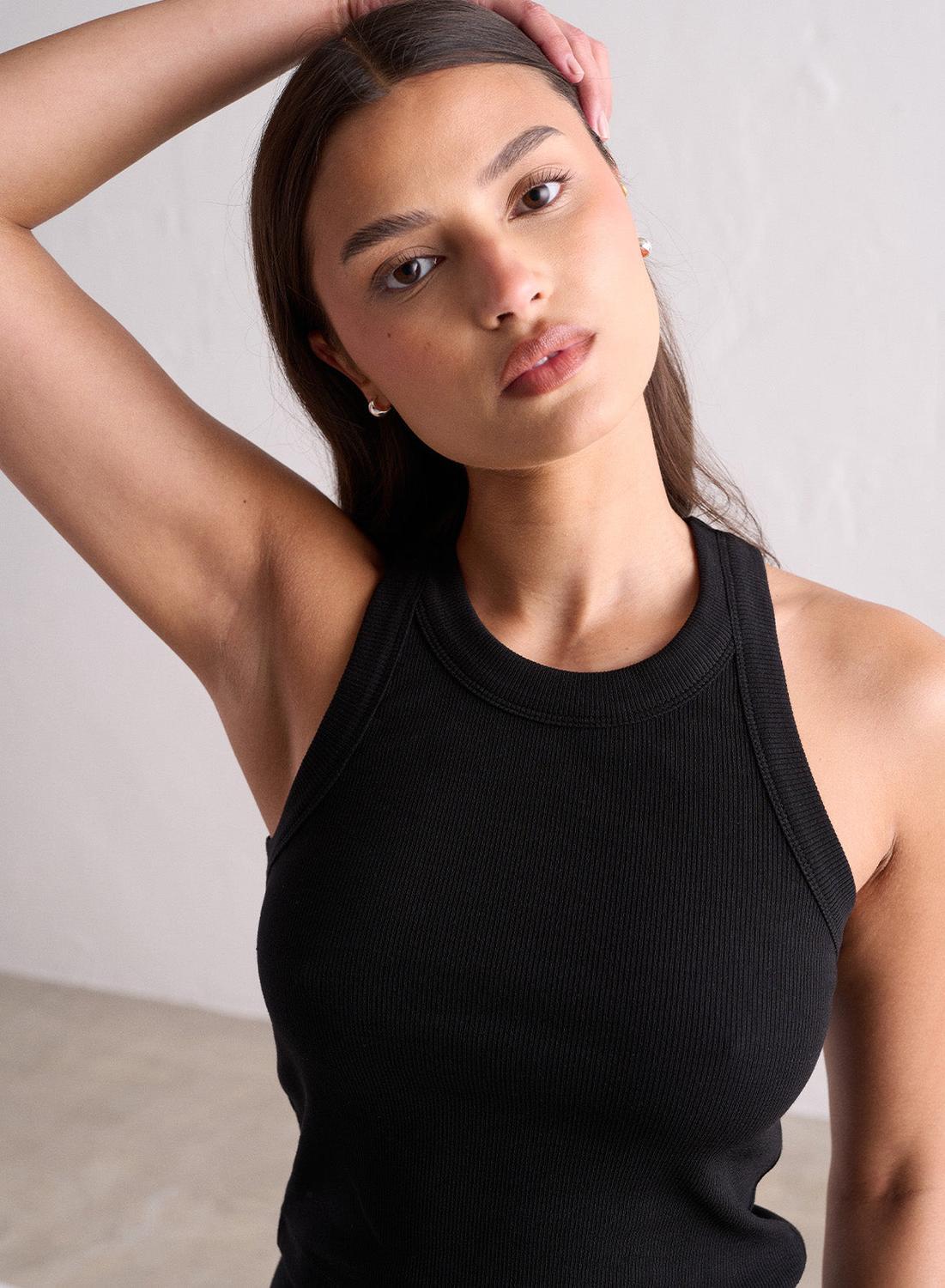 Top da yoga per donne ribbed leggeri neri 2/7