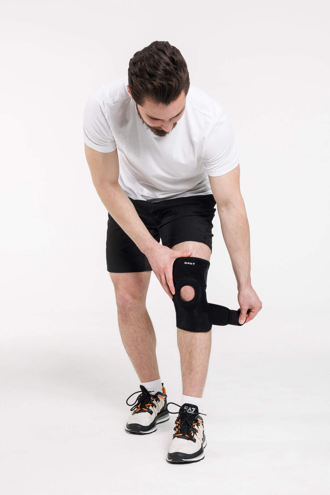 Zapinany stabilizator kolana z neoprenu z otworem na rzepkę DrFit 4/4