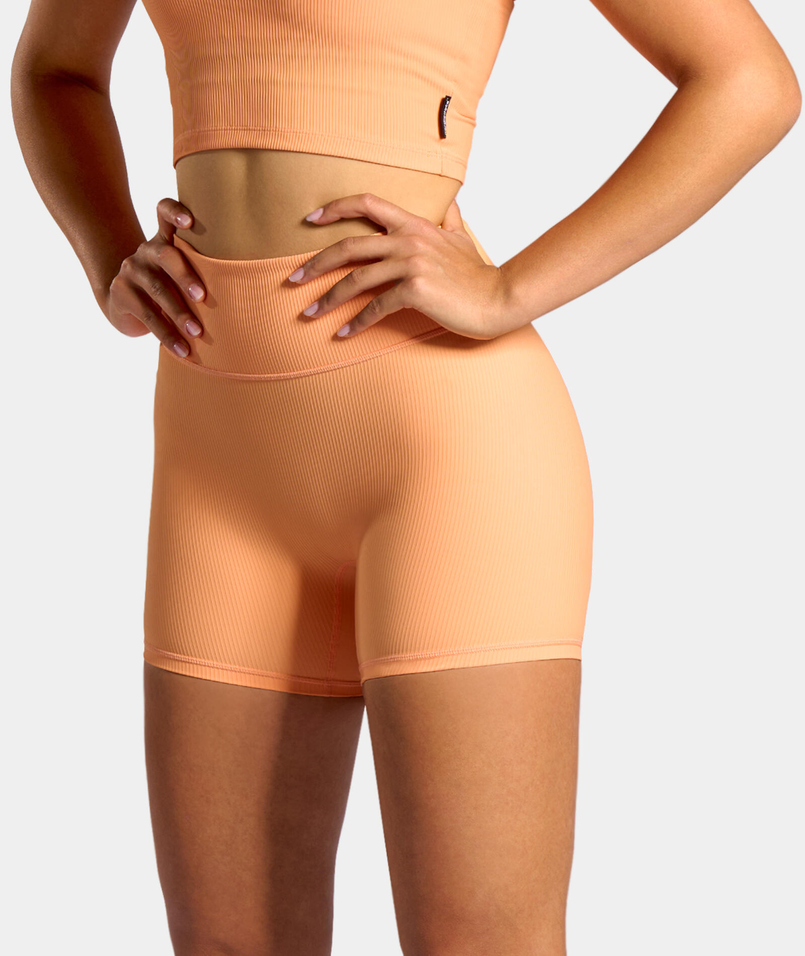 NORDICDOTS Dames Tennis/Padel Rib Shorts zonne oranje