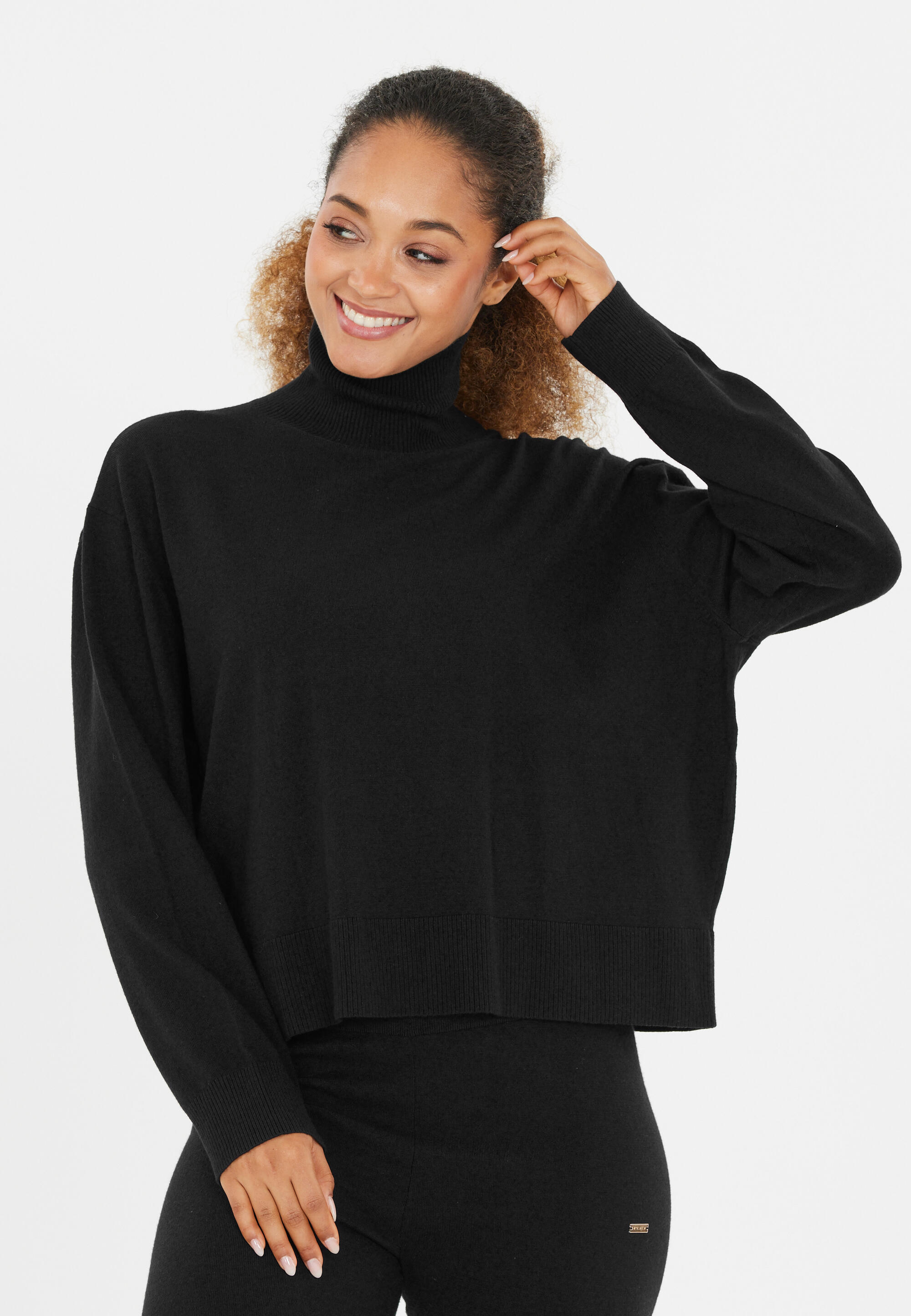 Pull col roulé femme Athlecia Dava 4/5