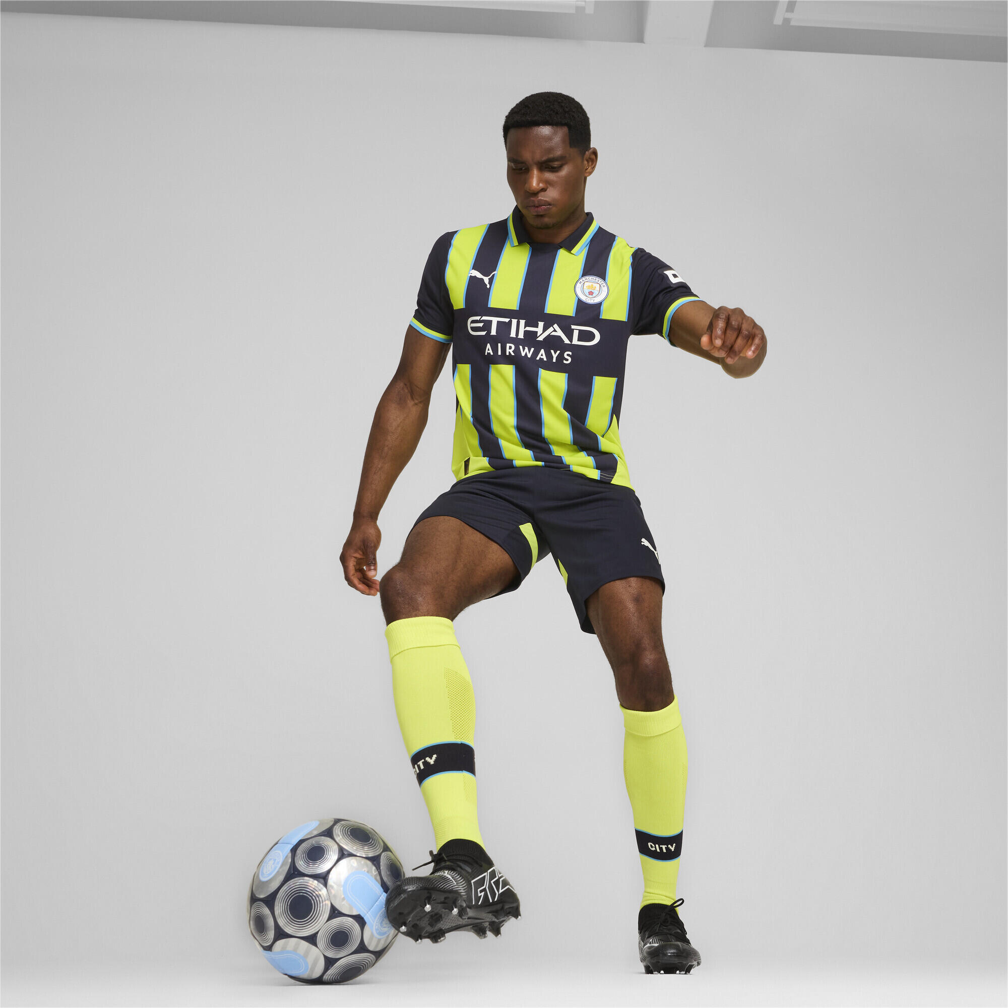 Manchester City 24/25 uitshirt voor heren PUMA New Navy Yellow Glow Blue 4/7