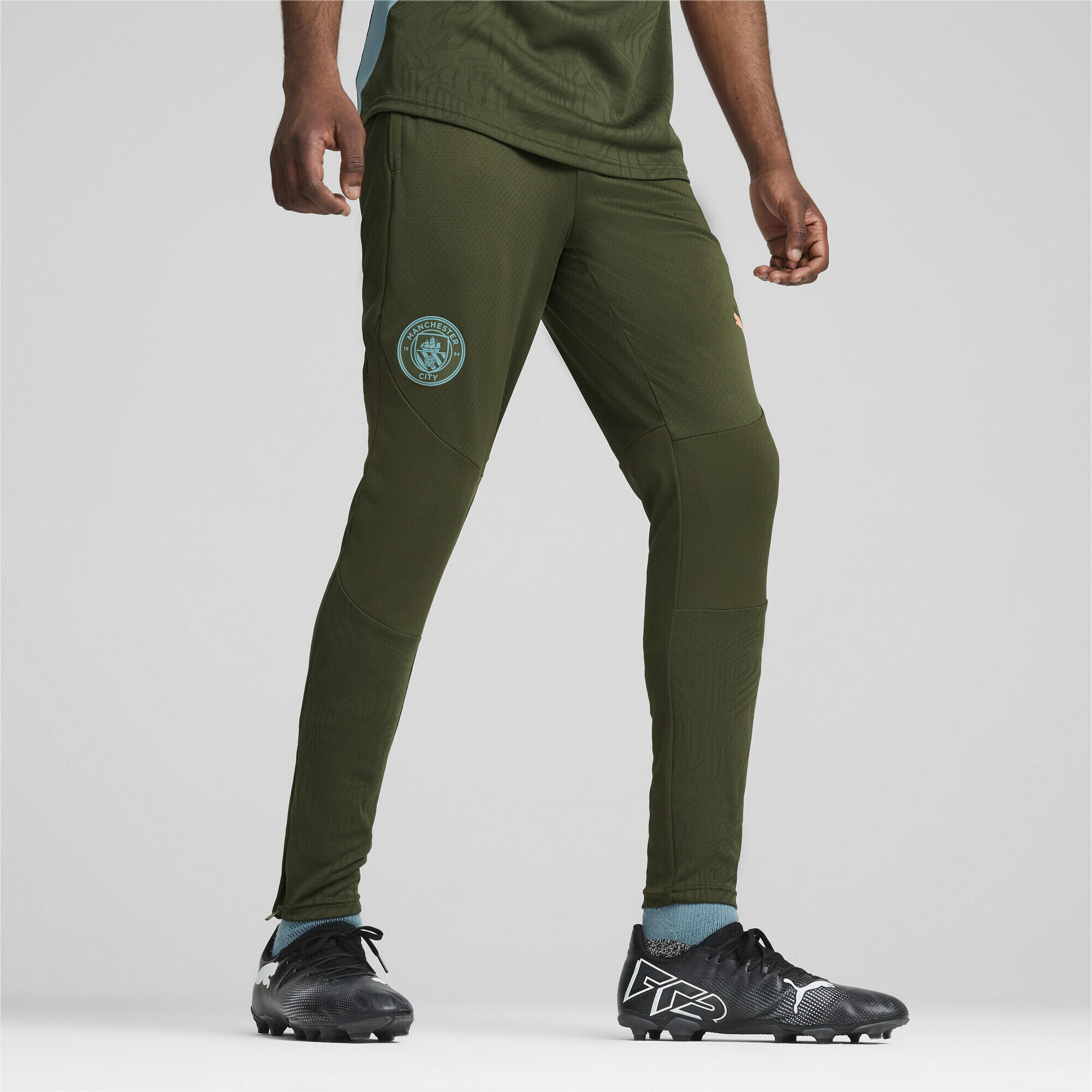 Pantaloni da allenamento Manchester City da uomo PUMA Myrtle Bold Blue Green PUMA Decathlon