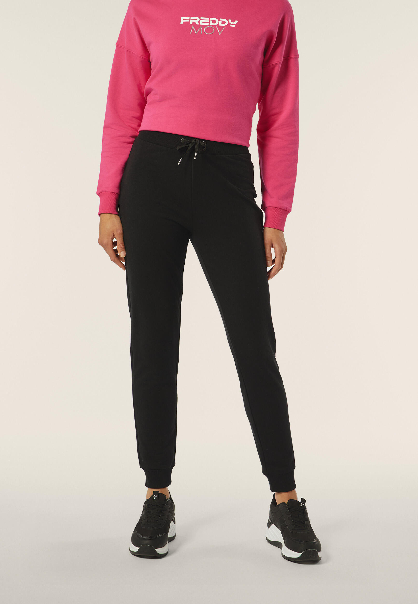 Pantaloni donna in felpa garzata con logo floreale sul fondo 3/5