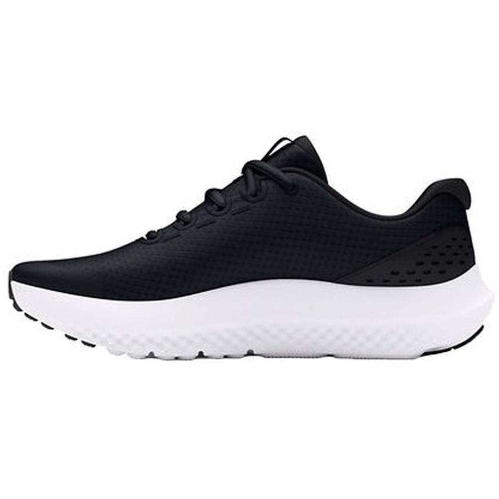 Zapatillas de la marca Under armour Surge 4 para niños unisex en color negro. 2/6