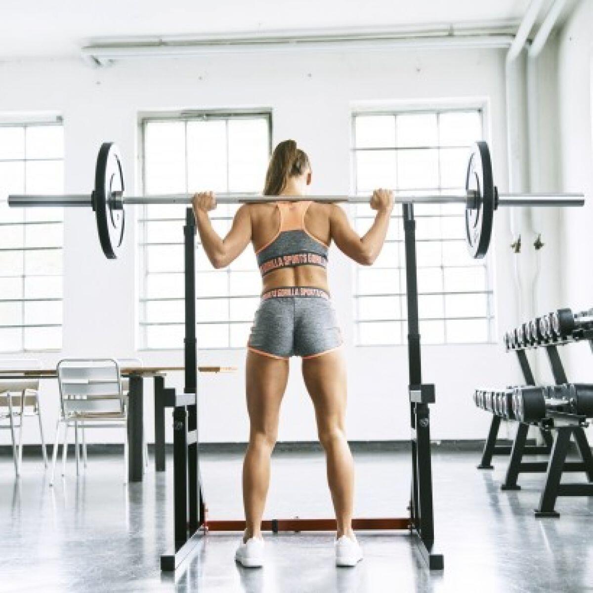 Rack à squat avec barre Ø 30/50 mm et disques 30 kg 6/7