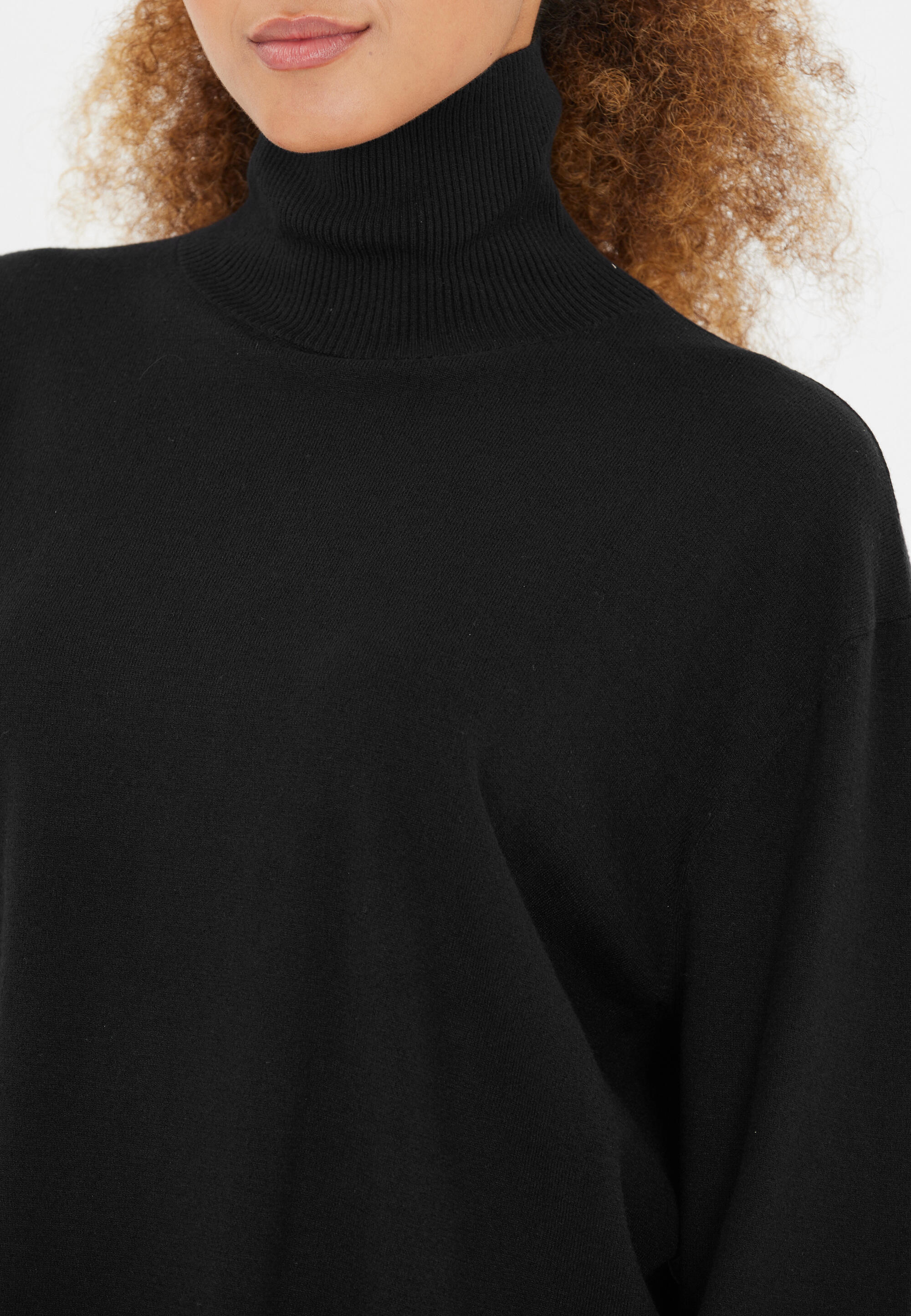 Pull col roulé femme Athlecia Dava 8/15