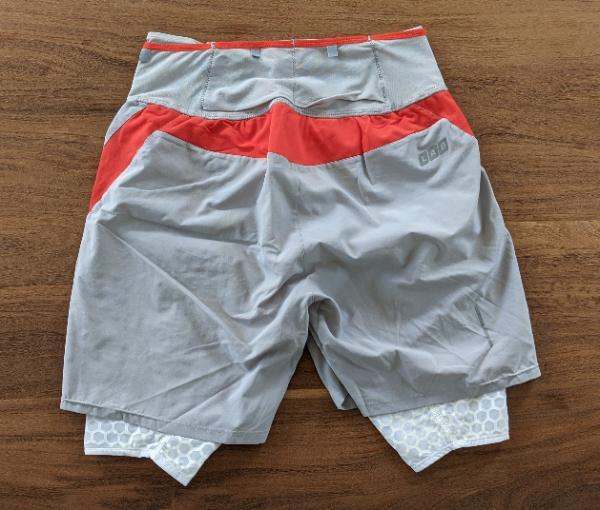 Tussen Particulieren - salomon slab exo twinskin compressie short wit M 2/3