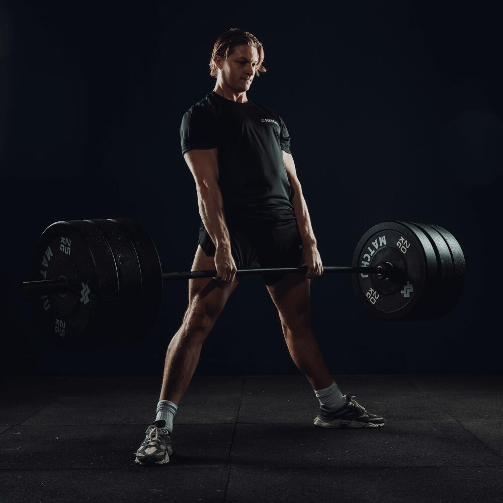 Barbell olympique - Haltère - 20kg - 220cm de longueur - Noir - Ø 28,5mm 5/7