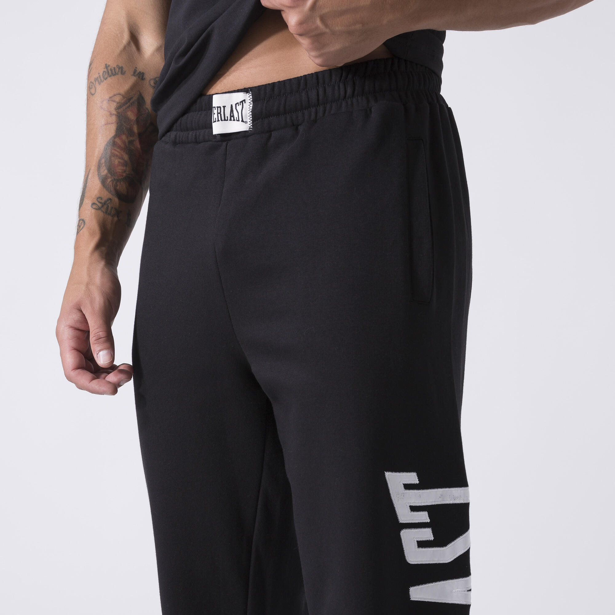 PANTALON EXCLUSIF EN MOLLETON NOIR COTON, POLYESTER 5/7