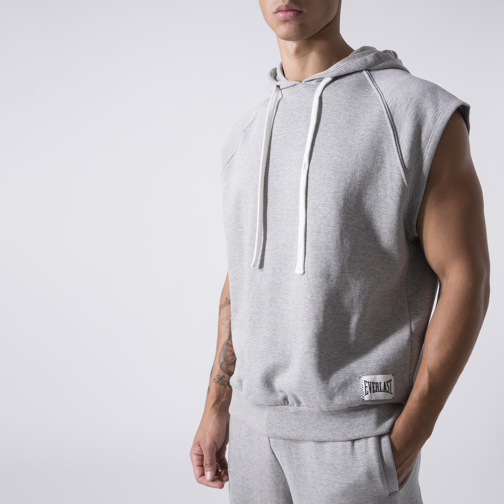 EXCLUSIVO CHALECO DE ALGODÓN CON CAPUCHA GRIS MELANGE ALGODÓN, POLIÉSTER 5/7