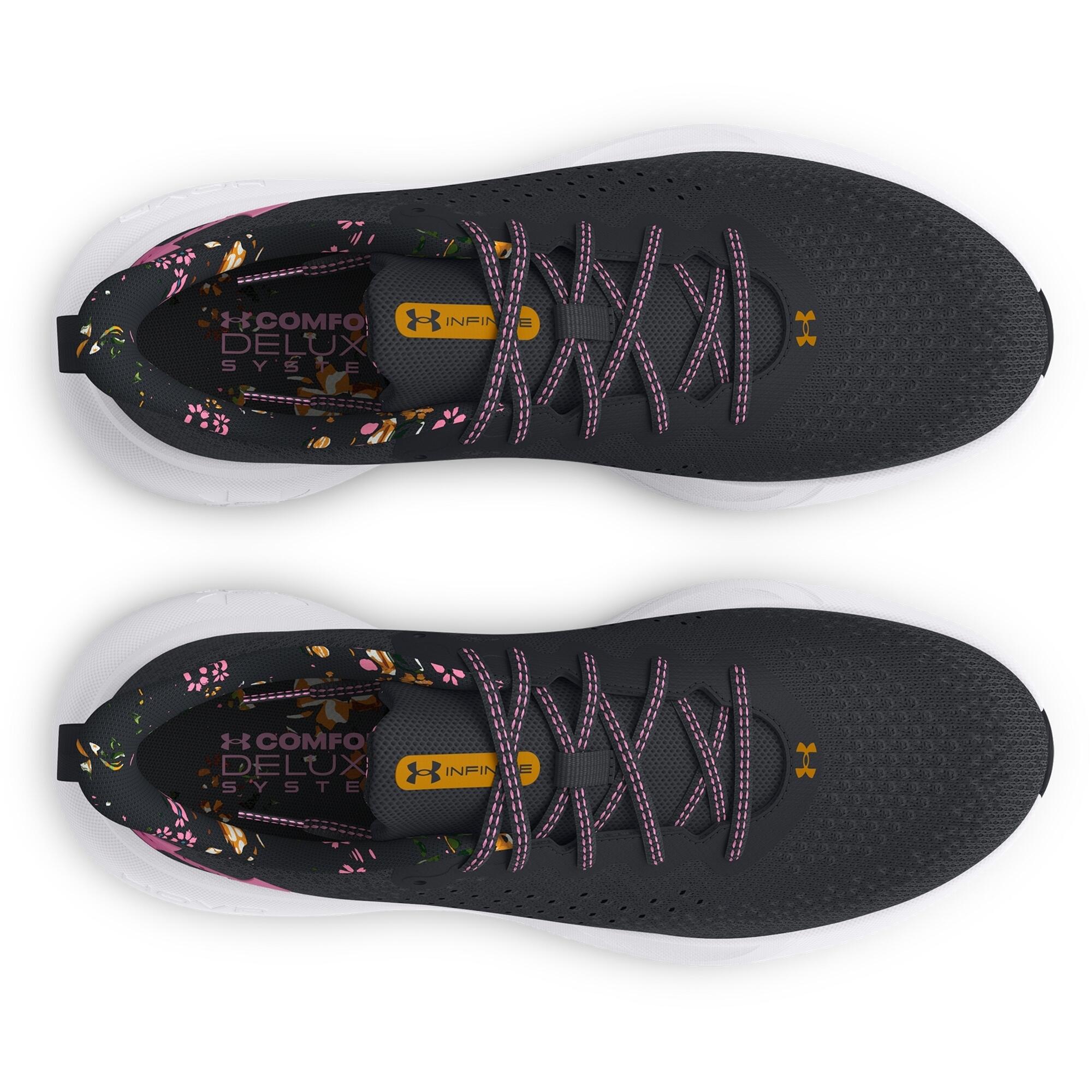 Vrouwen hardloopschoenen met print Under Armour Surge 4 4/7