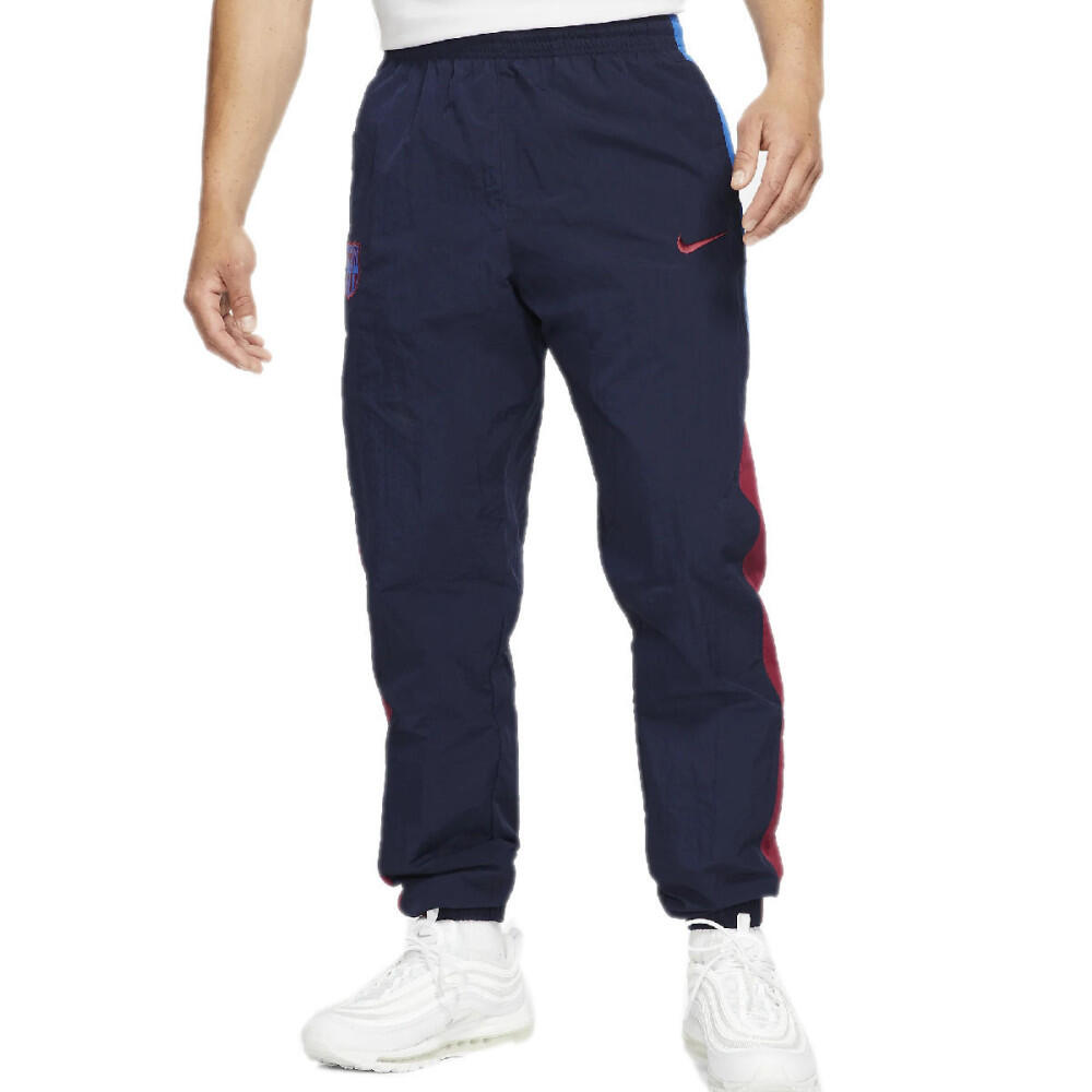 Pantalones de chándal para hombre Nike FC BARCELONA WINDRUNNER 1/3
