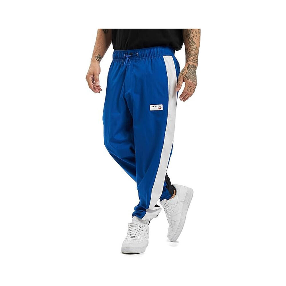 Pantalon de survêtement New Balance NB ATHLETICS WINDBREAKE 3/7