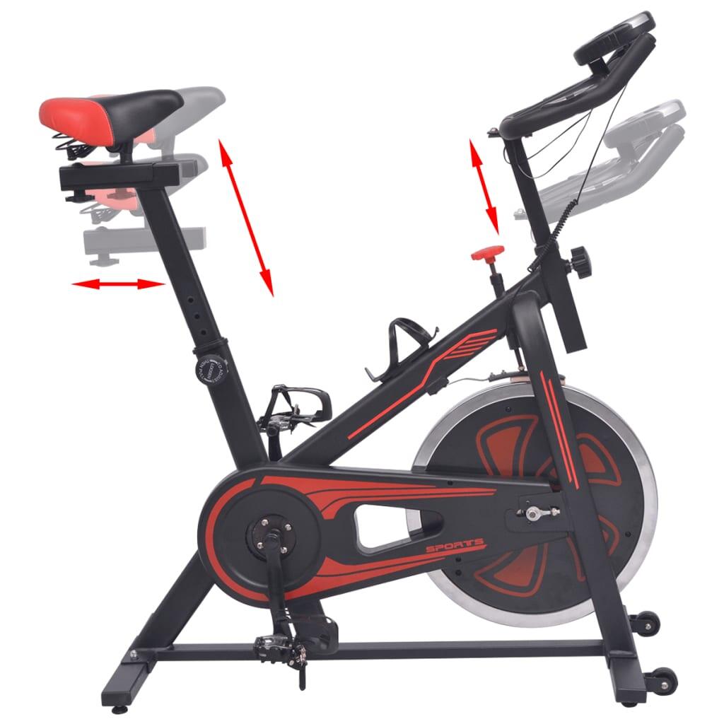 Bicicleta estática con sensores de pulso negra y roja 3/5