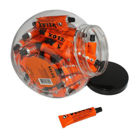 Glas mit 50 Tuben Flickenkleber Auflösung Velox 10 ml