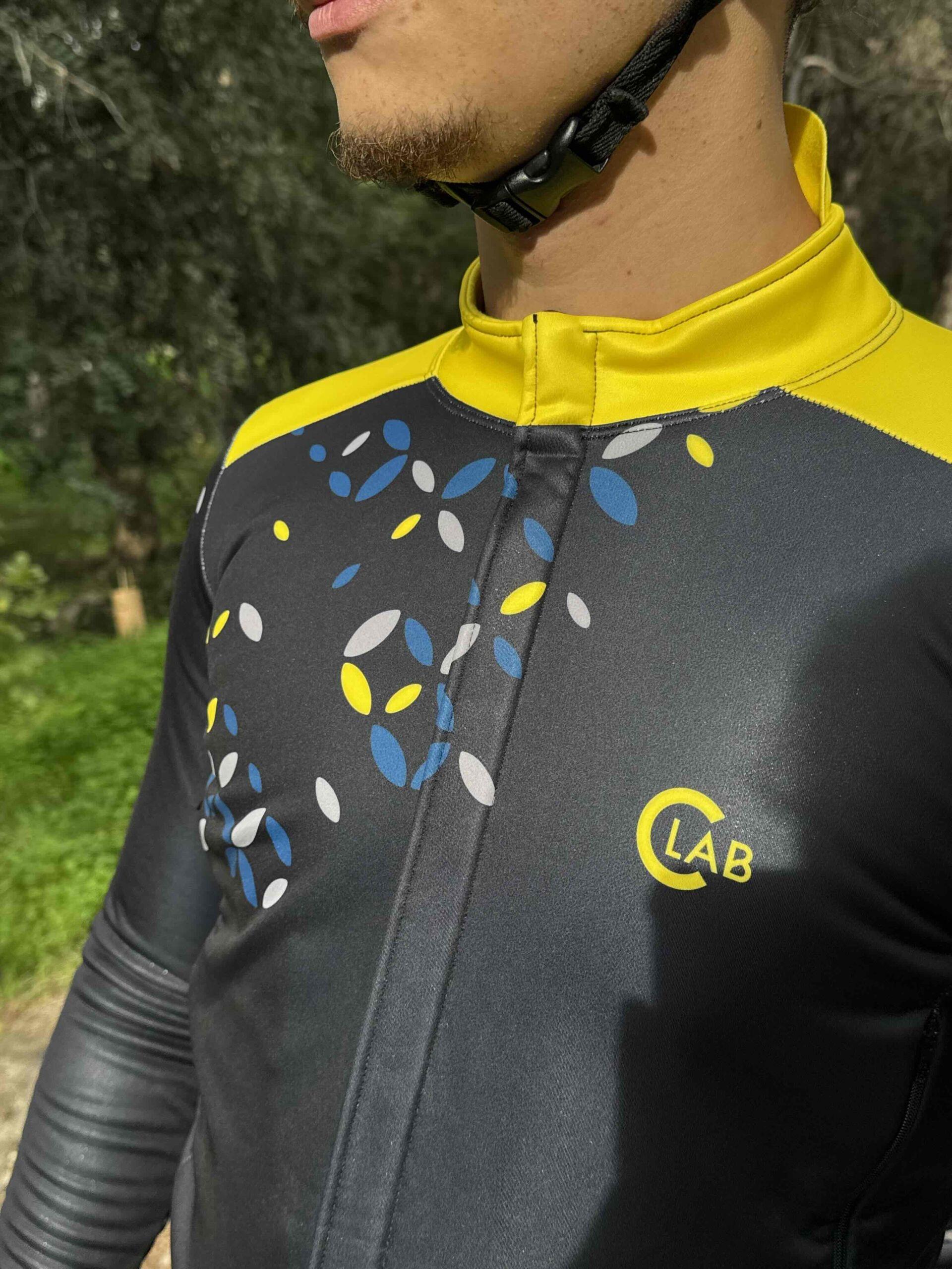 PIRINEUS WASSERDICHTE WINTERJACKE MIT SCHWARZ/GELBEN KREUZEN 3/7