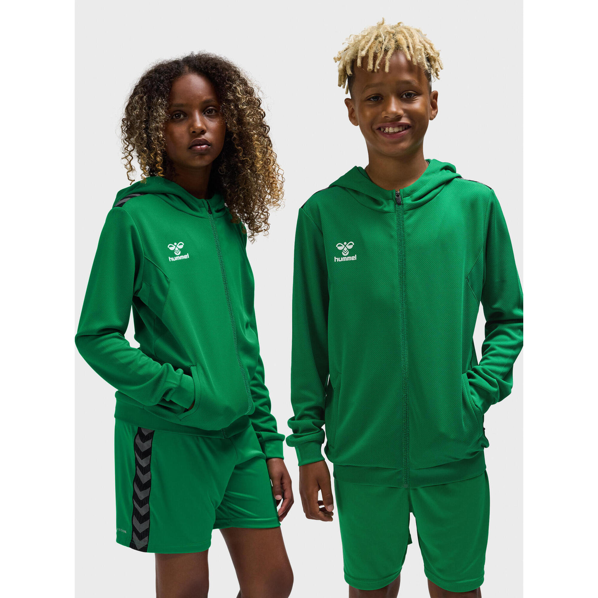 Dziecięca poliestrowa kurtka dresowa z kapturem i zamkiem błyskawicznym Hummel A