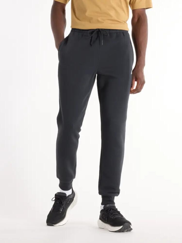 Spodnie dresowe męskie NEW BALANCE bawełniane 3/7