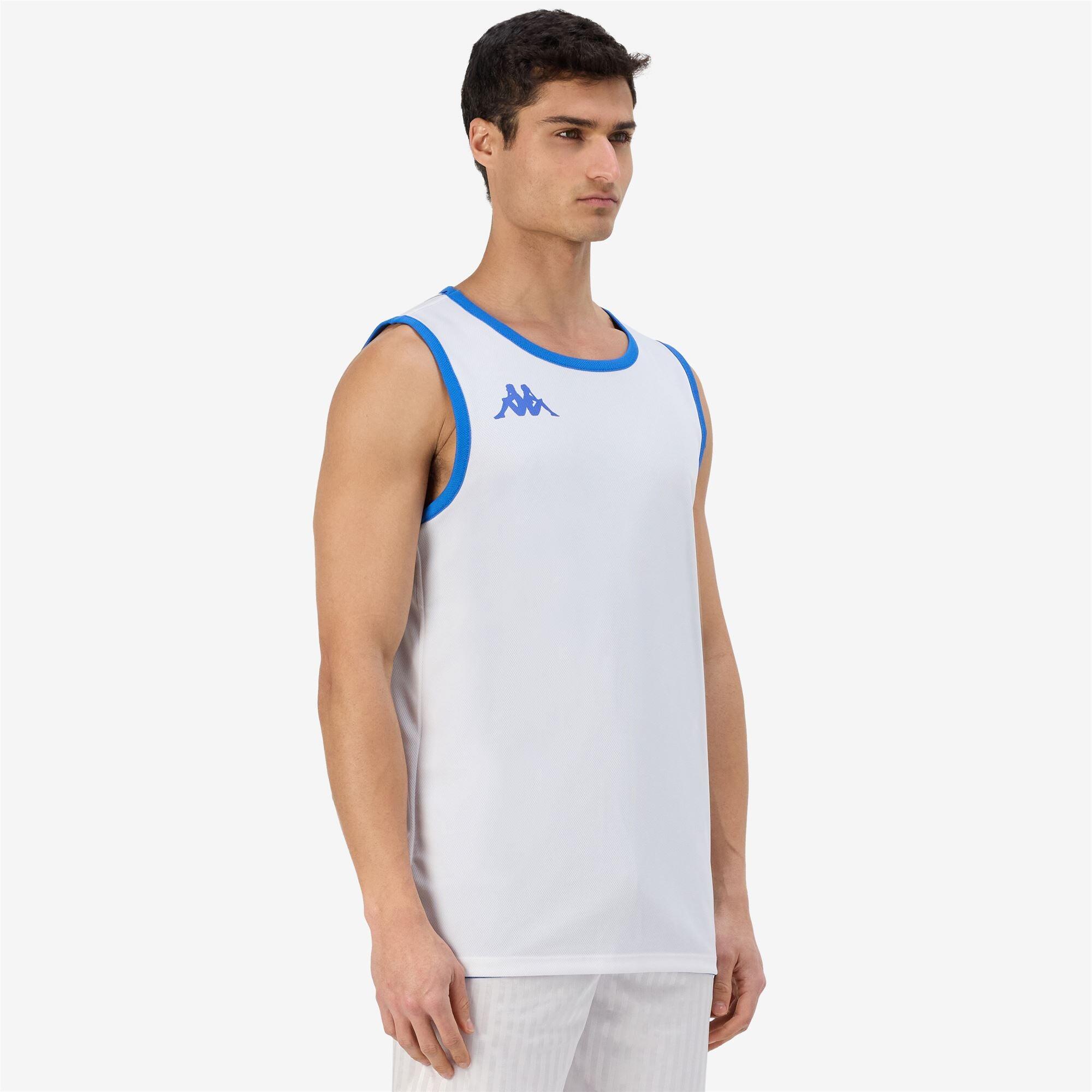 Completo canotta pantaloncino da bambino in poliestere blu da basket 6/7