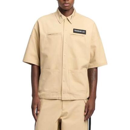 Veste Reebok Modèle S S Shirt Couleur Brun Clair