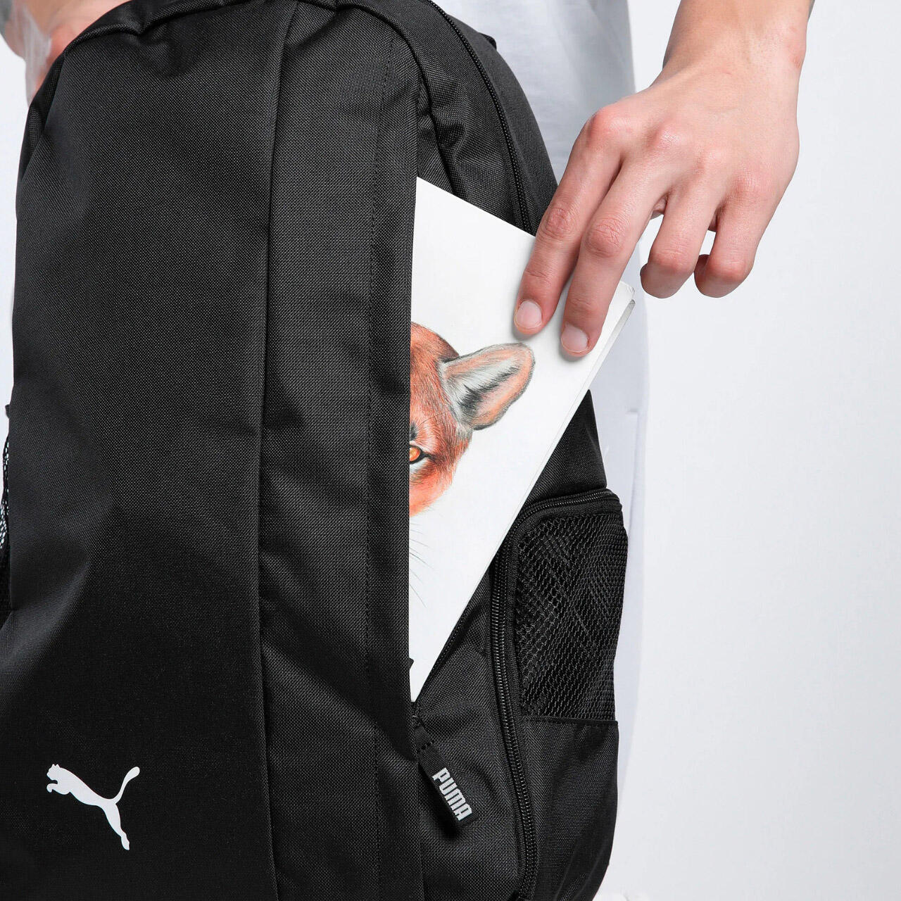 Mochila Puma 24 L, compartimento principal con cremallera doble 5/7