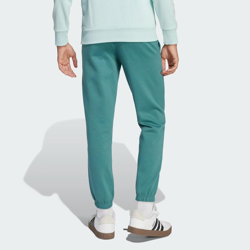 Pantalon en molleton à slogan adidas