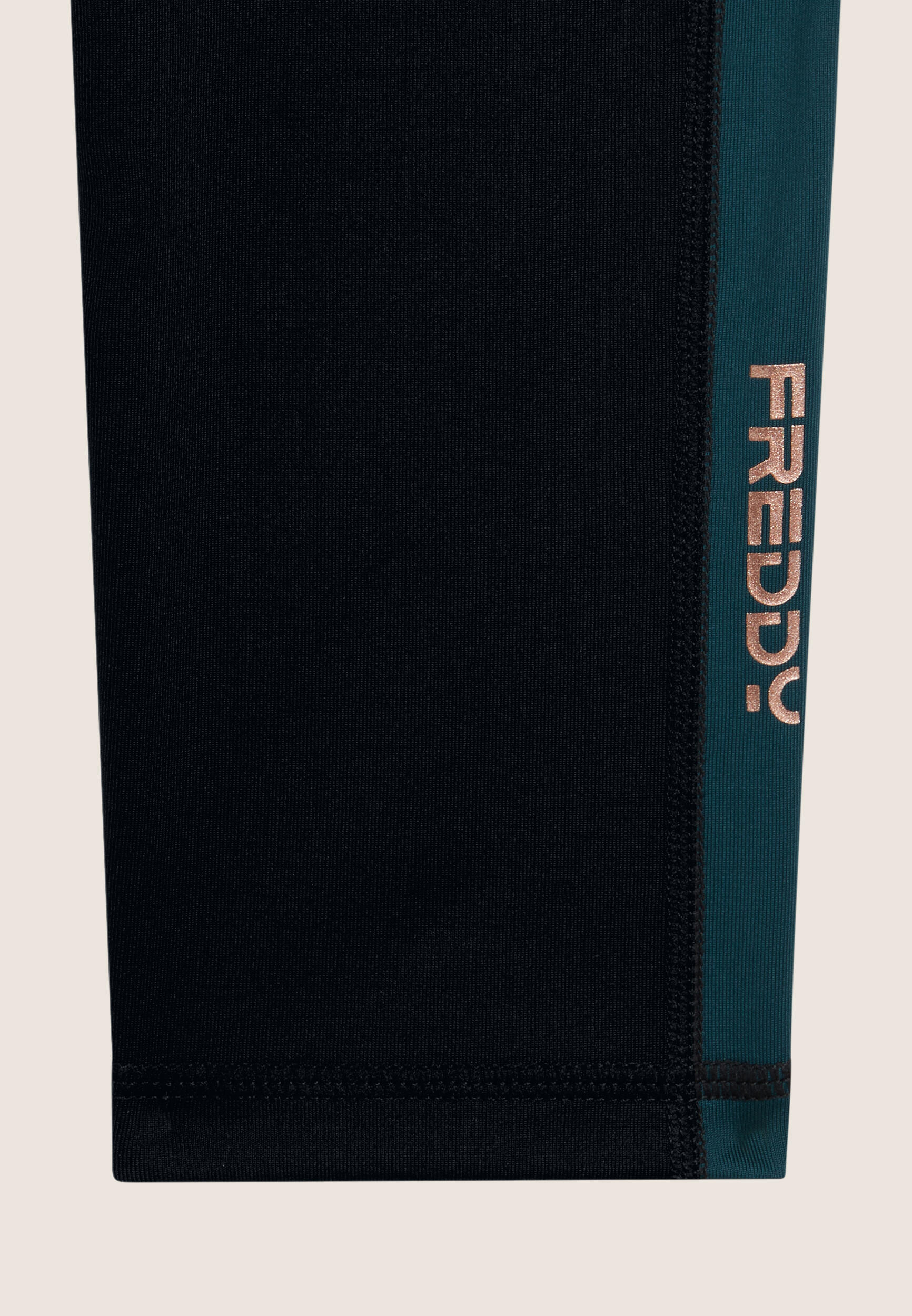 Leggings 7/8 in tessuto tecnico con vita alta a incrocio 3/3