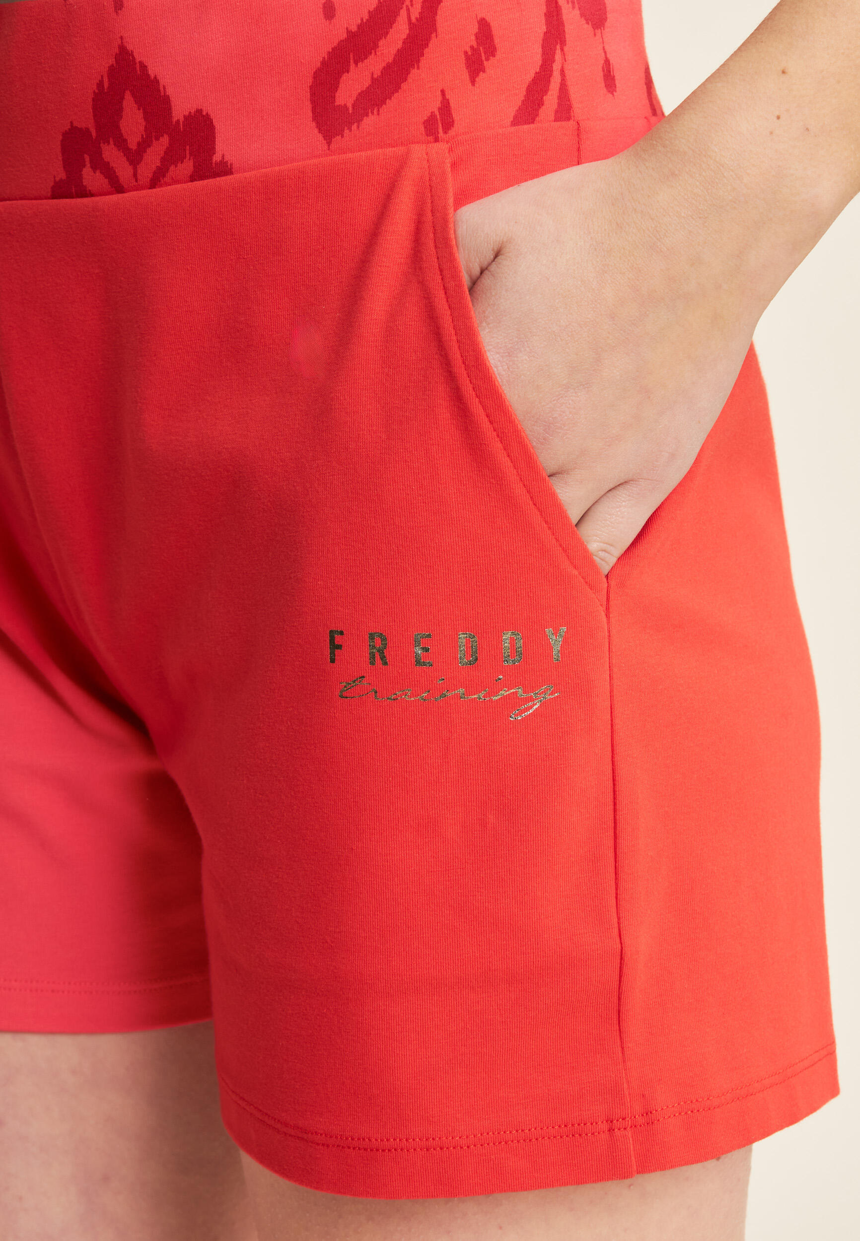Short sportivi con fascia in vita floreale 4/5