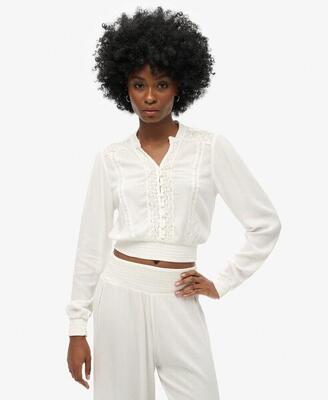 Blouse met lange mouwen en gerimpelde kanten rand.