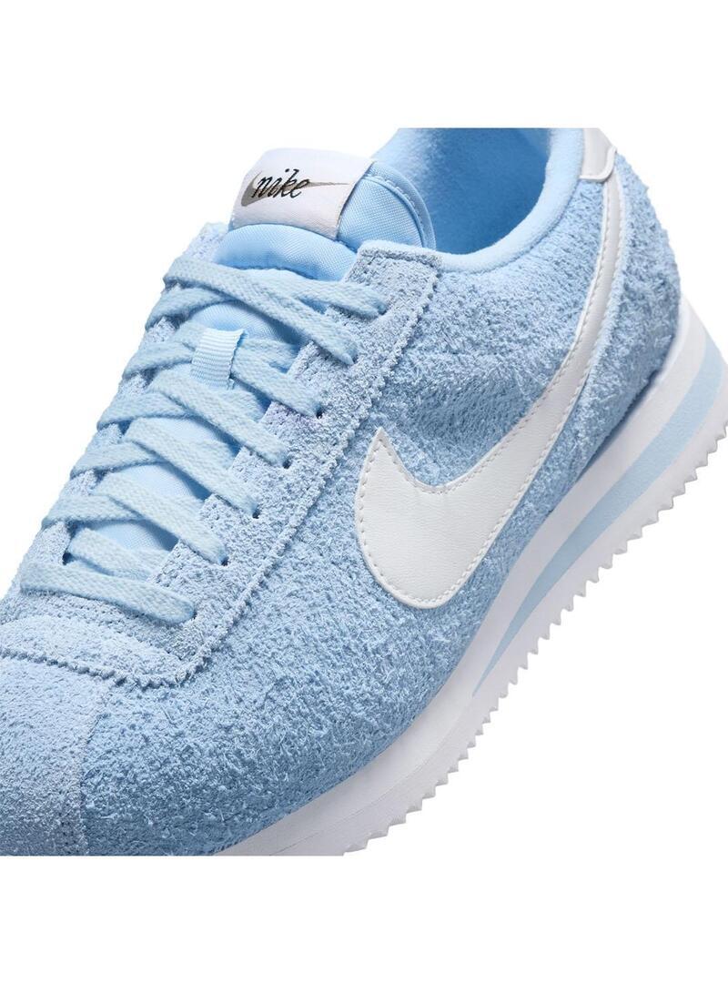 Tênis feminino Nike Cortez azul. 3/7