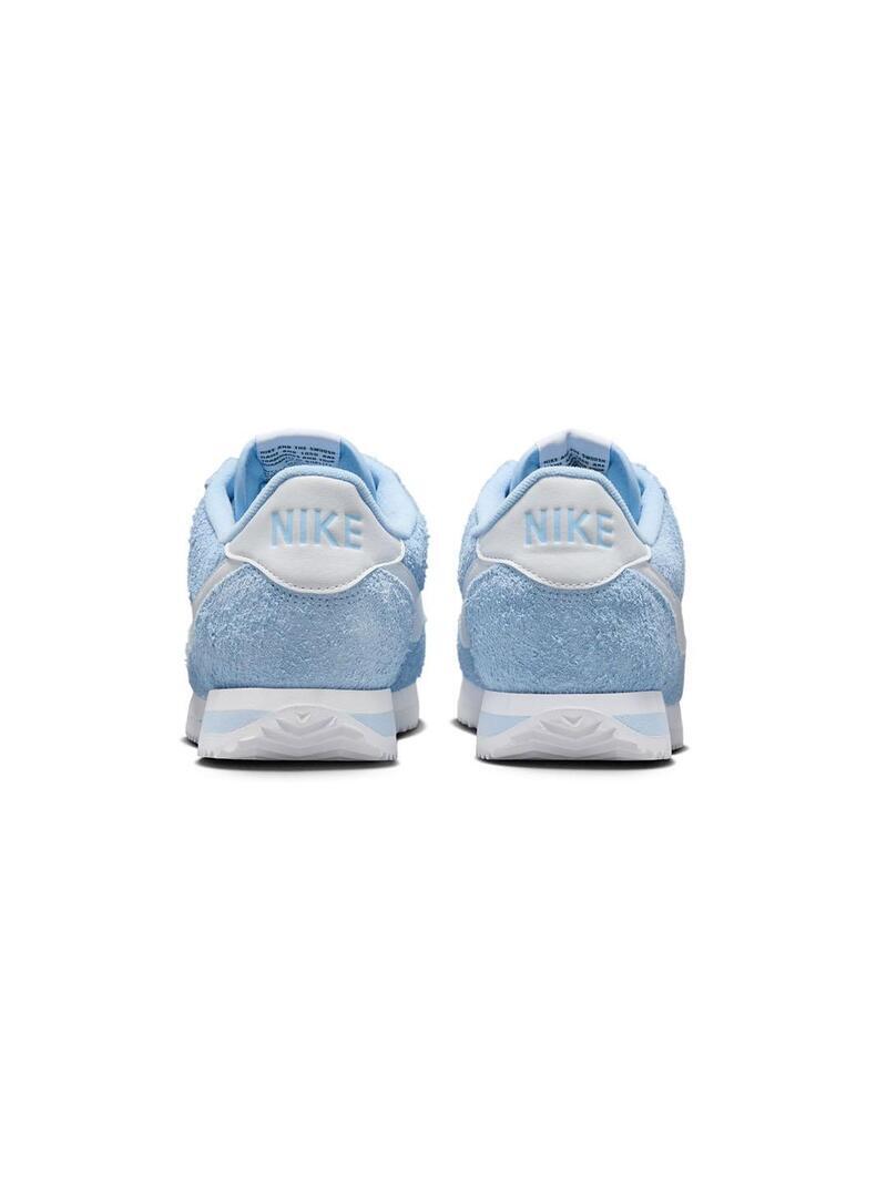 Tênis feminino Nike Cortez azul. 5/7