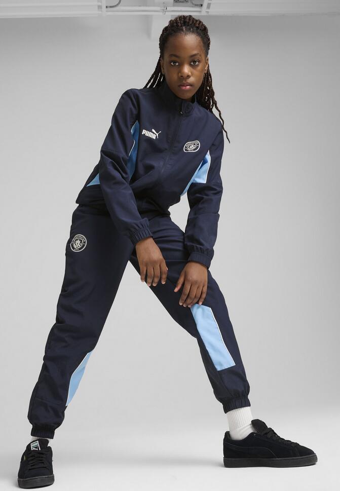 Młodzieżowe spodnie Manchester City ftblARCHIVE PUMA Navy Team Light Blue