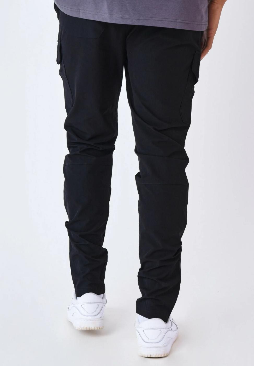Pantaloni e sovrapantaloni per uomo Project x paris neri. 2/5