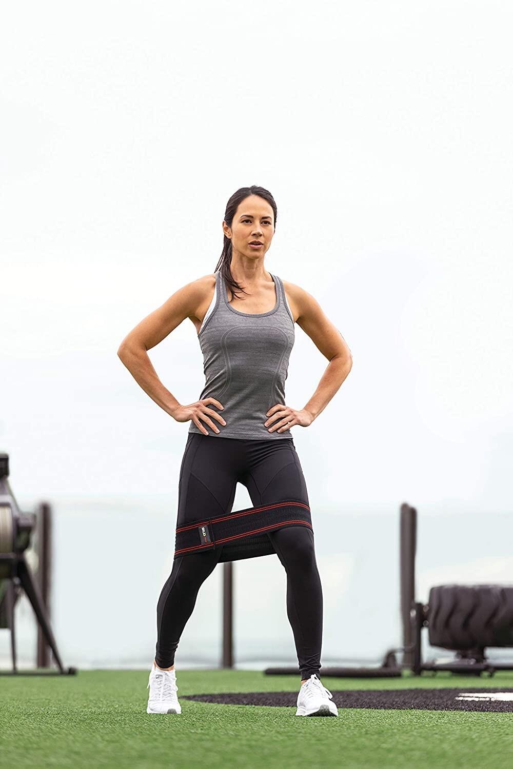 Bande de résistance SKLZ Pro Knit Hip Light noir/jaune, Intensité légère 4/5