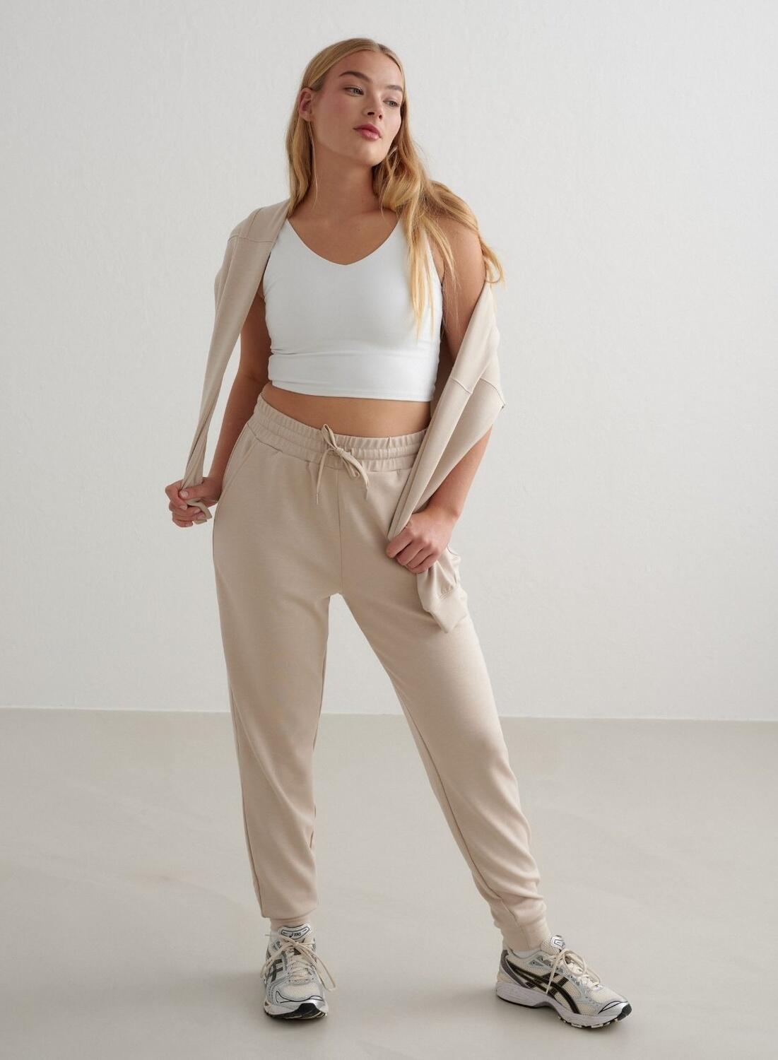 Donna Pantaloni della tuta Traspiranti Crema 2/4