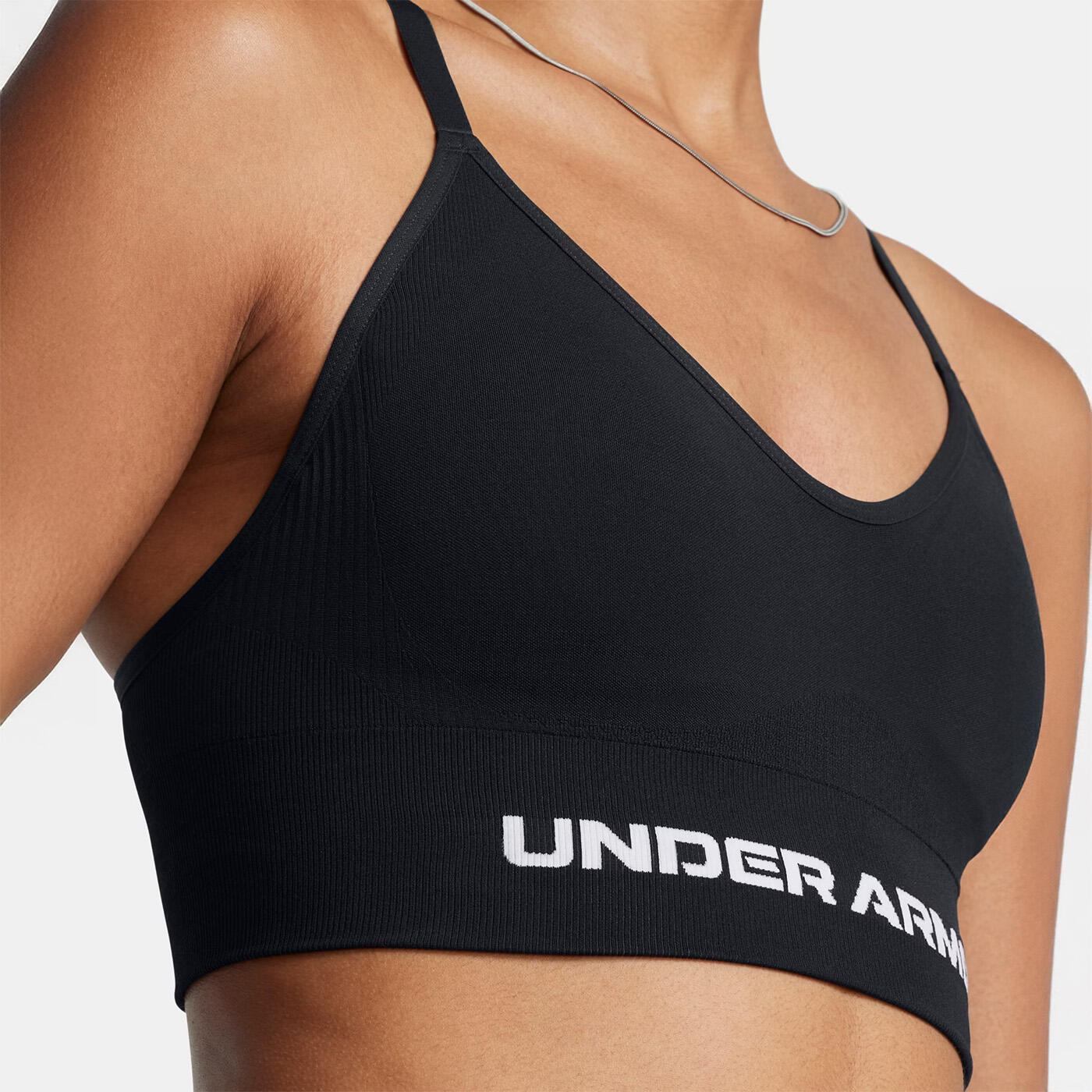 Top esportivo preto e branco com suporte leve UA Vanish Seamless feminino 3/7