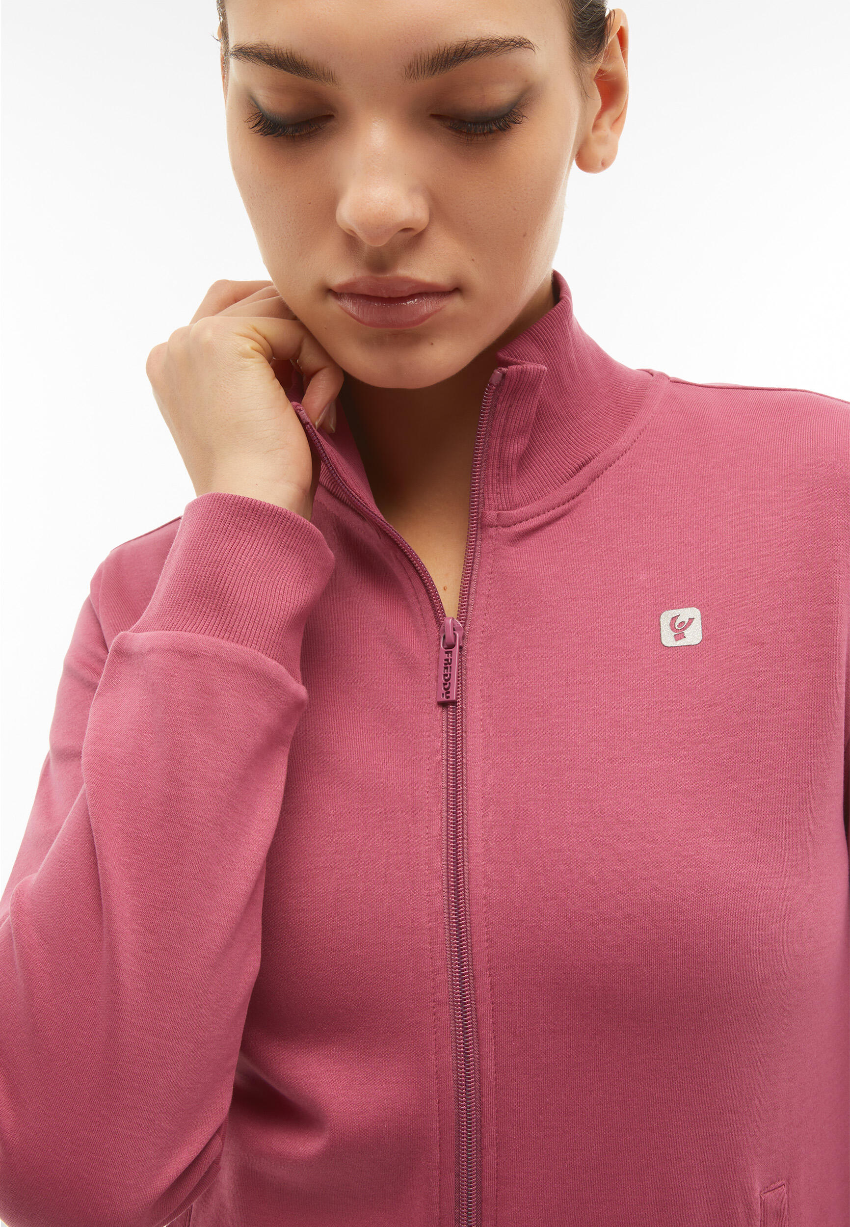 Tuta sportiva in interlock con felpa collo alto e zip 4/5