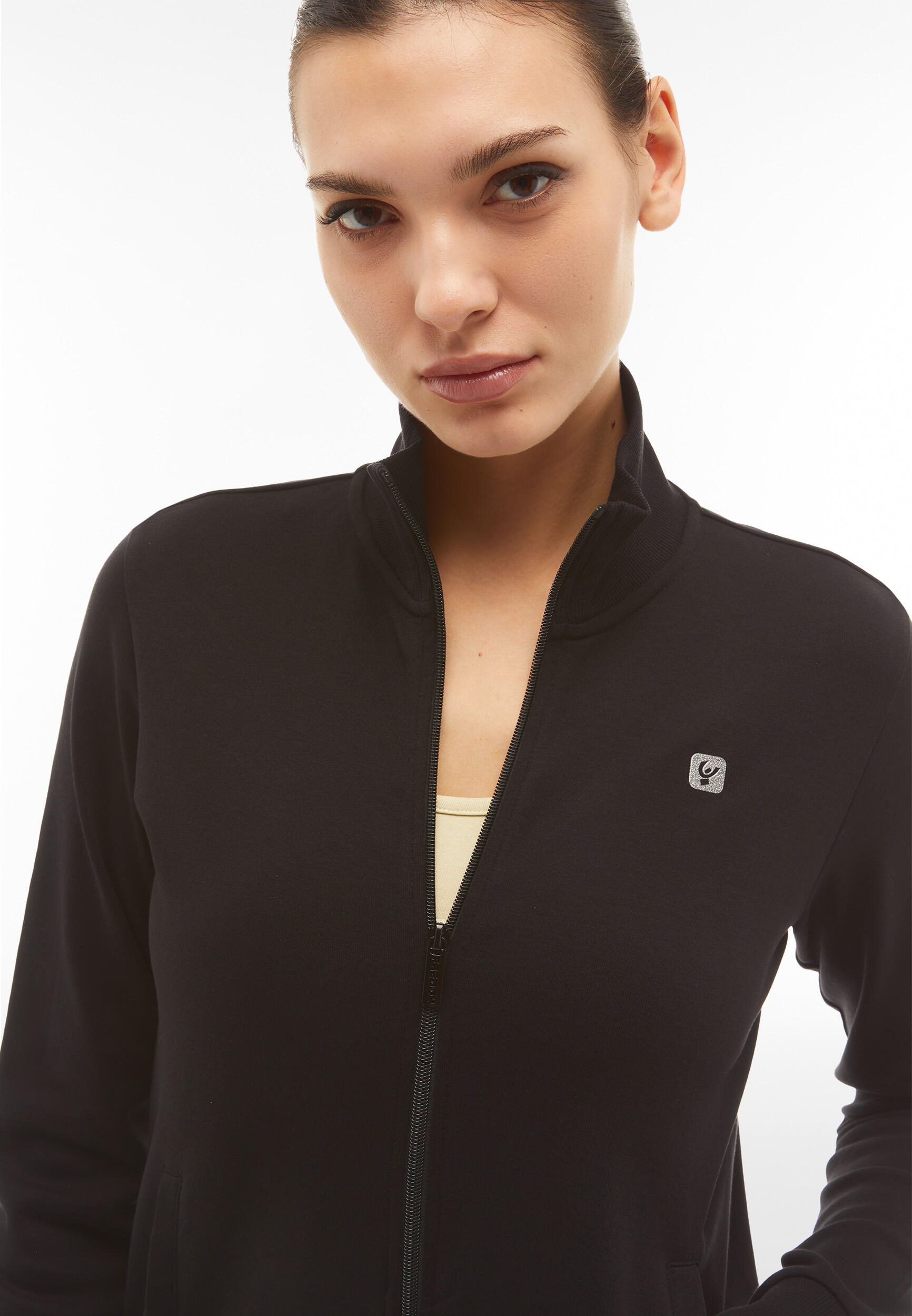 Tuta sportiva in interlock con felpa collo alto e zip 4/5