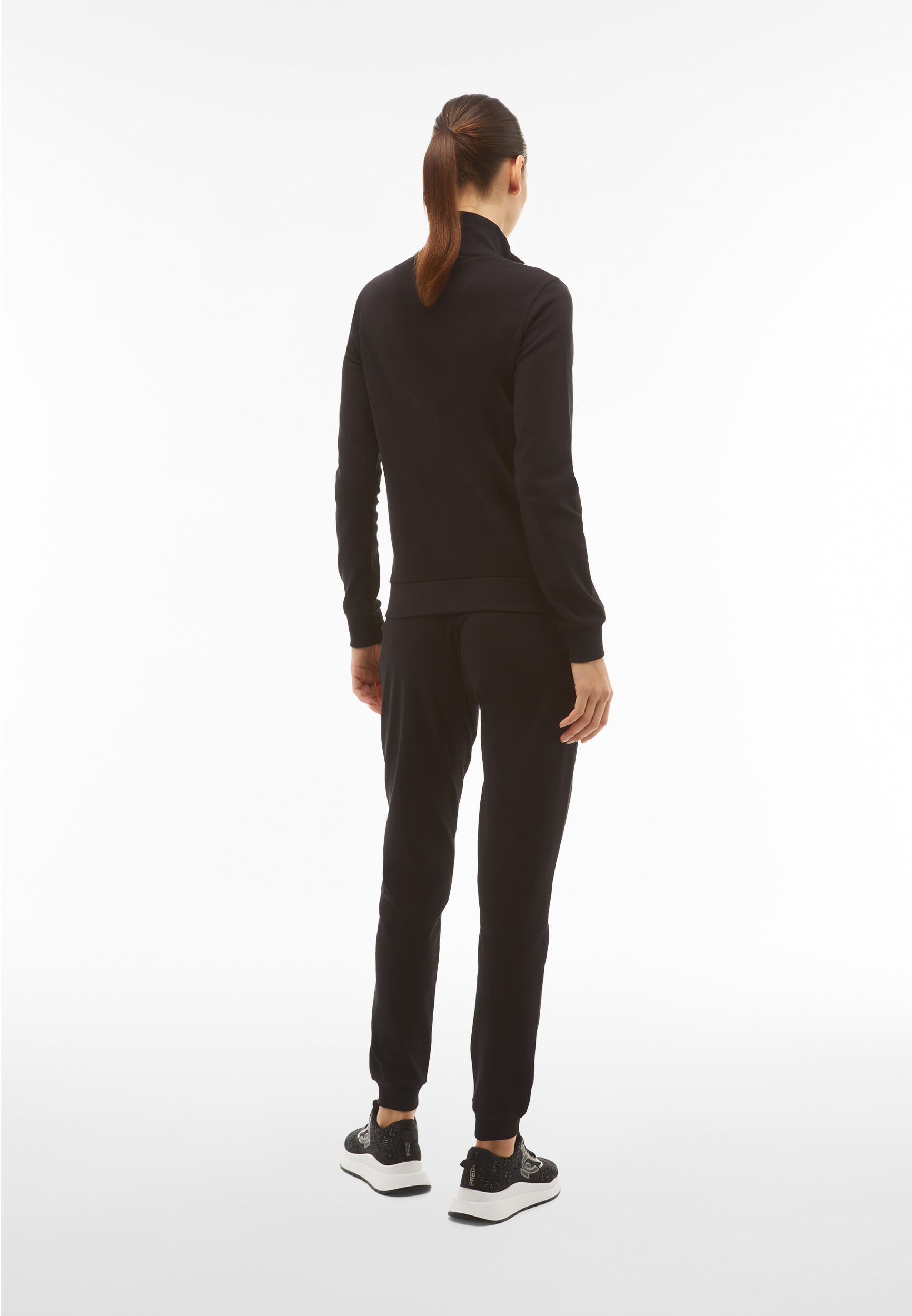 Tuta sportiva in interlock con felpa collo alto e zip 3/5