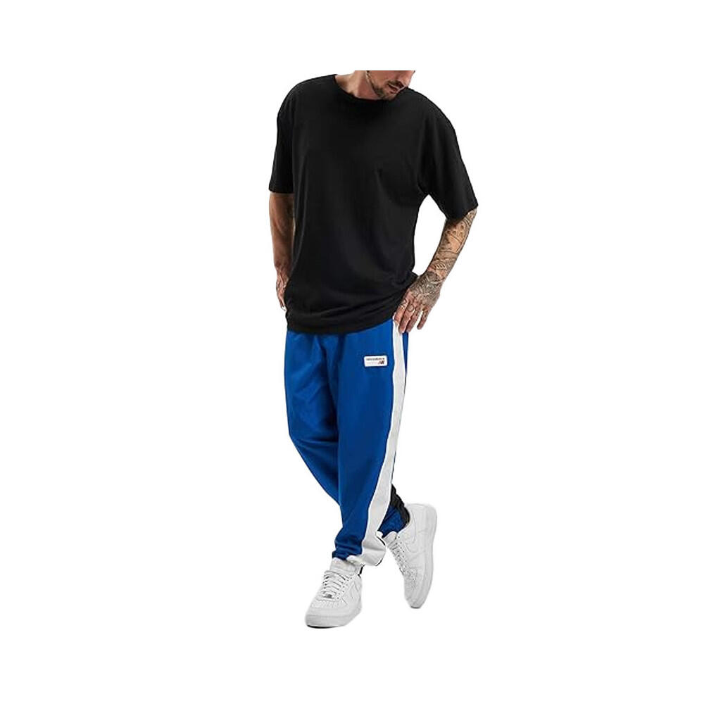 Pantalon de survêtement New Balance NB ATHLETICS WINDBREAKE 7/7