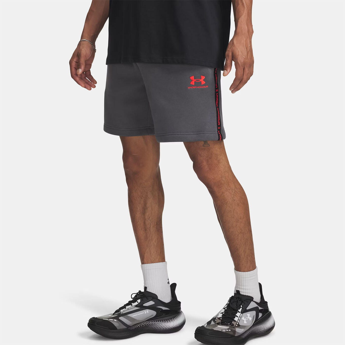 Short à bandes griffées UA Icon Fleece pour homme Under Armour Gris 1/4