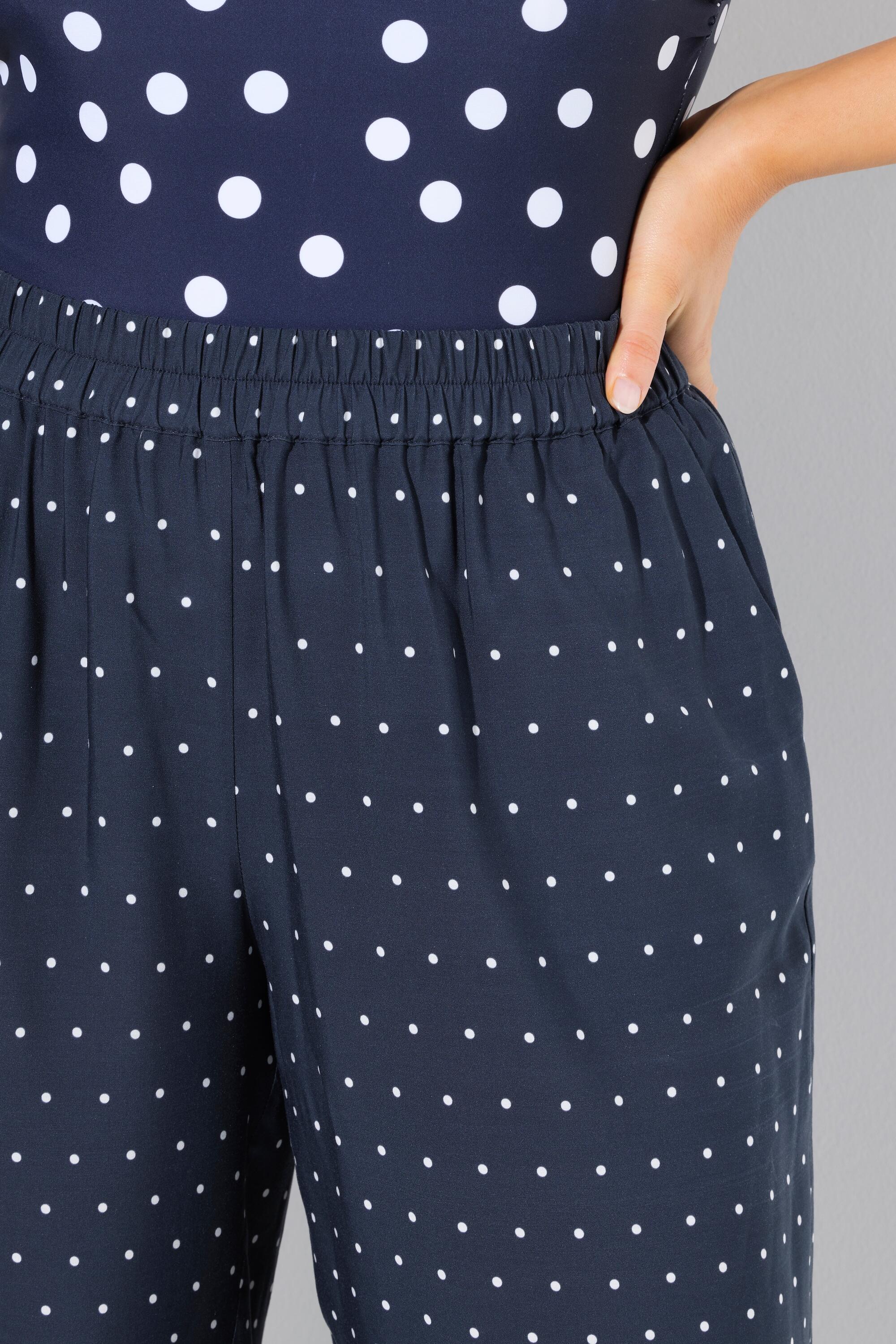 Femme Pantalon palazzo à pois. Jambe large et droite. Taille élastique 10/13
