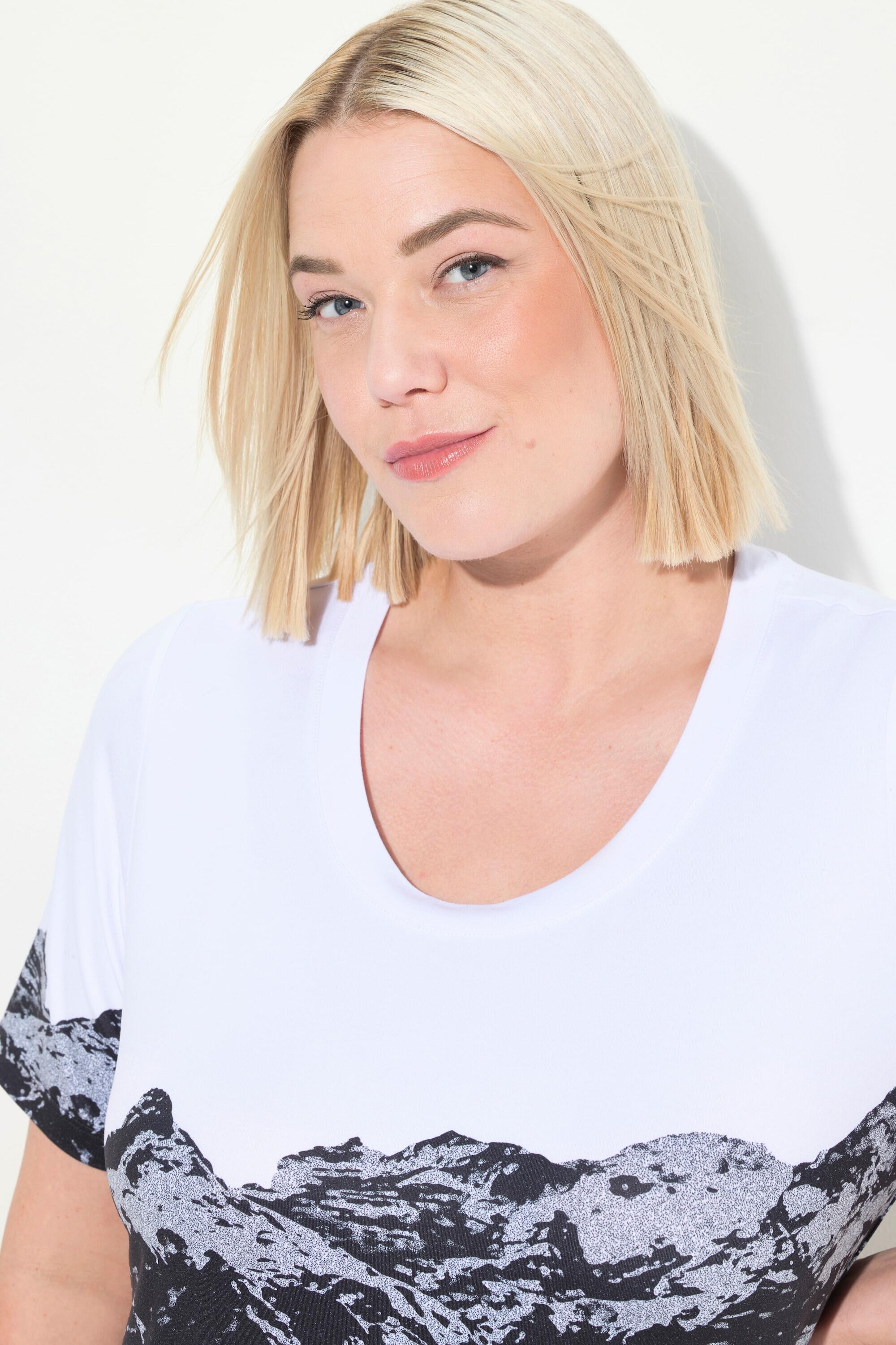 Femme T-shirt technique à col rond et manches courtes. Matière 3/7