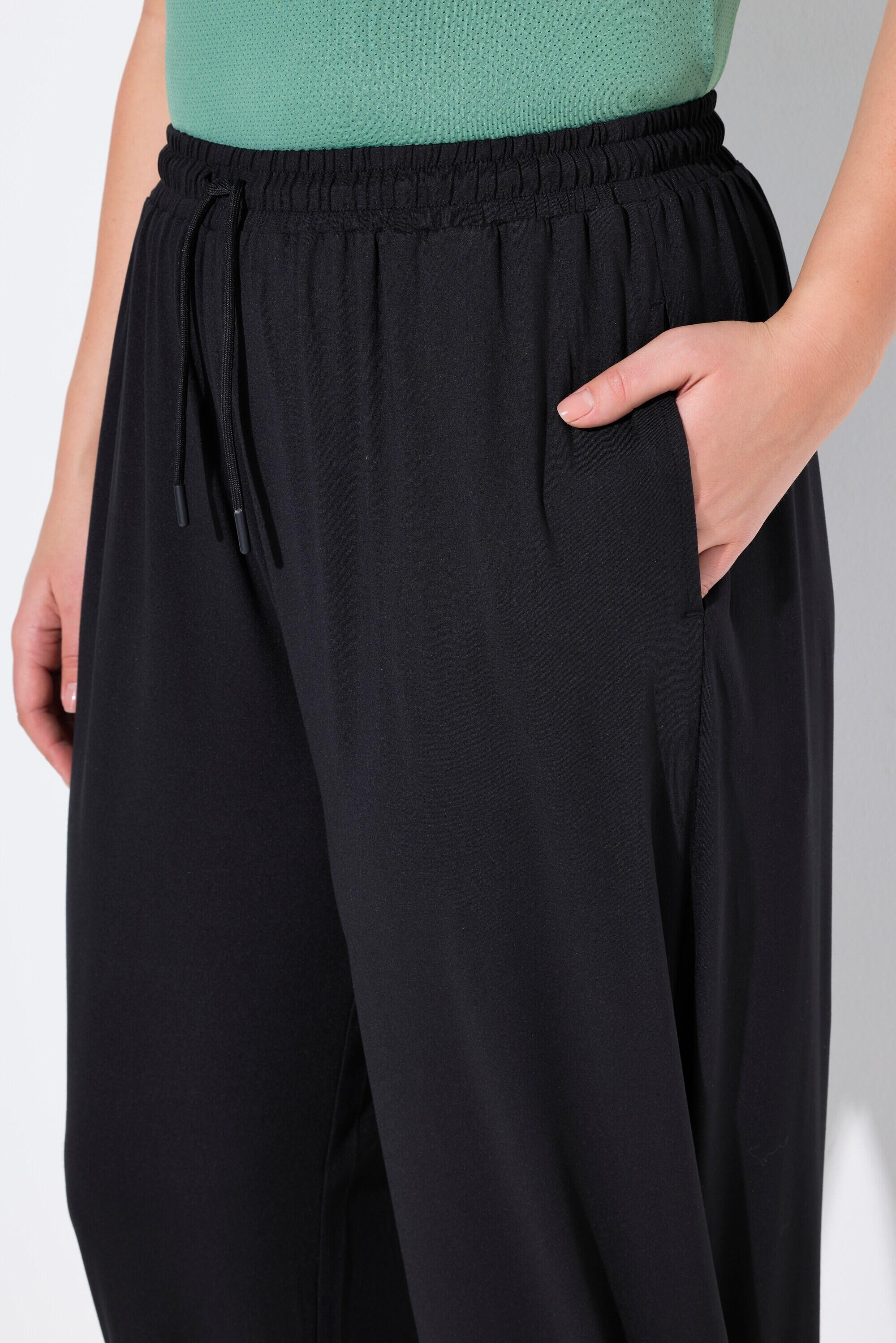 Femme Pantalon de jogging technique. Séchage rapide. Matière recyclée 5/7