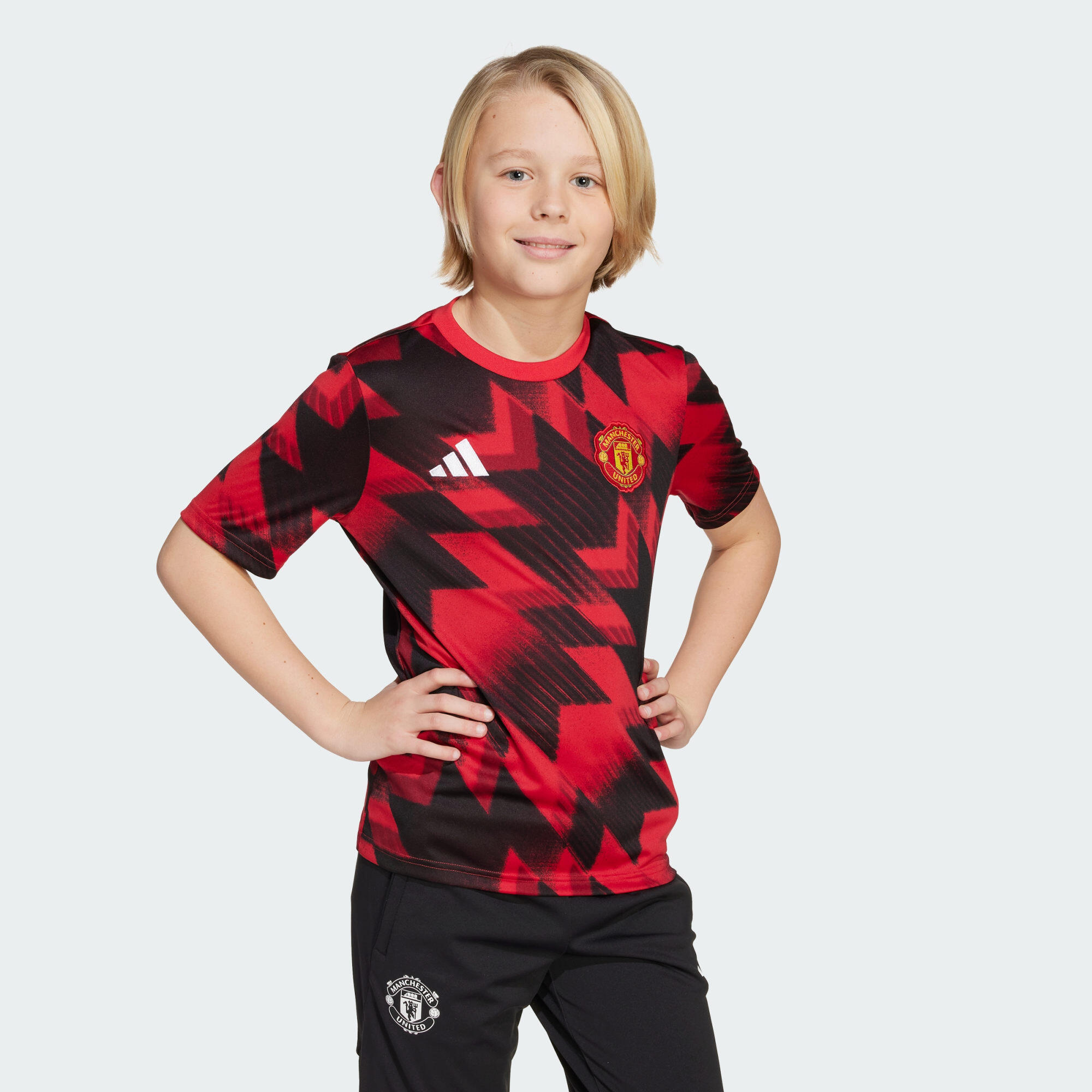 ADIDAS Předzápasový dětský dres Manchester United 25/26