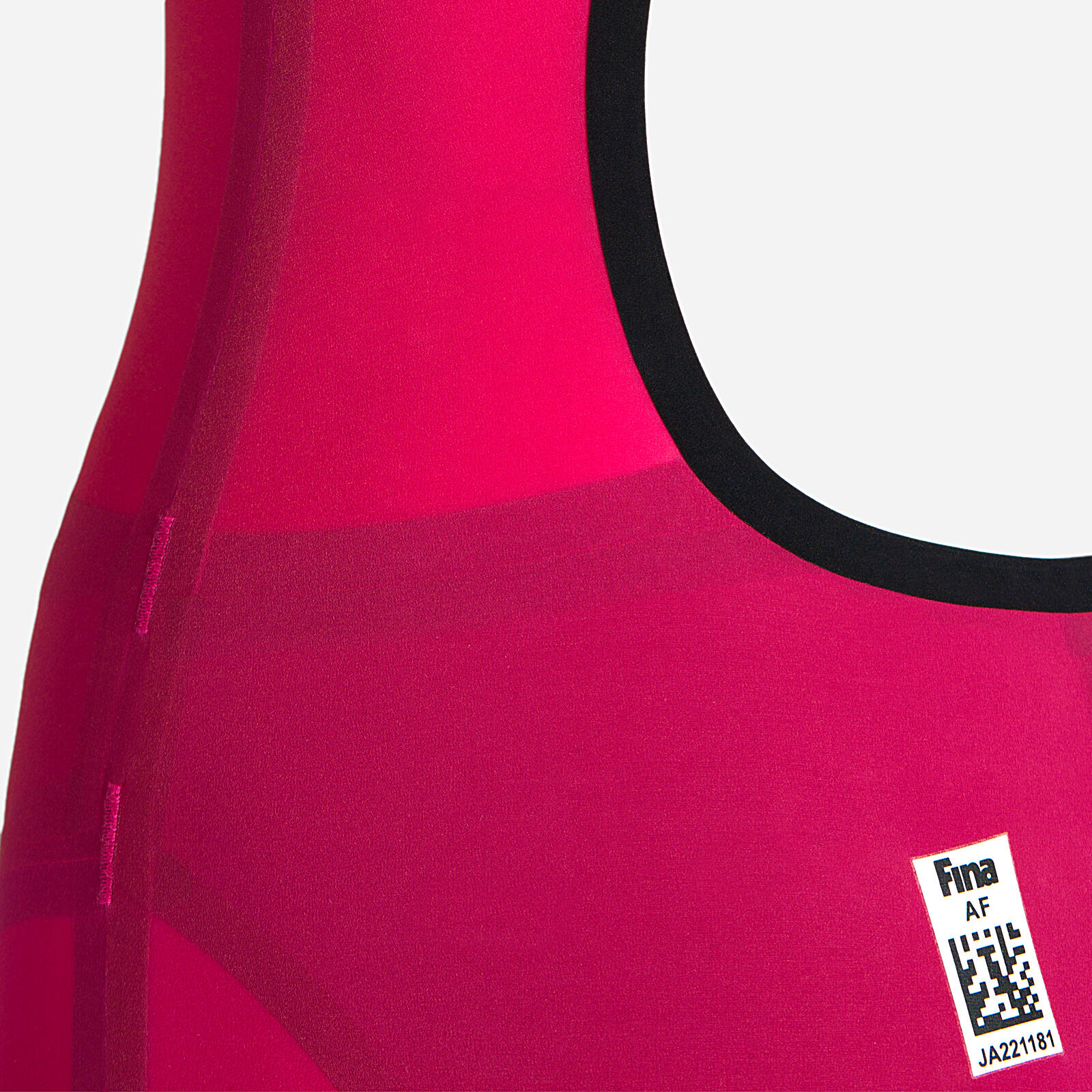 Bañador de mujer color magenta en material sintético para natación. 4/5