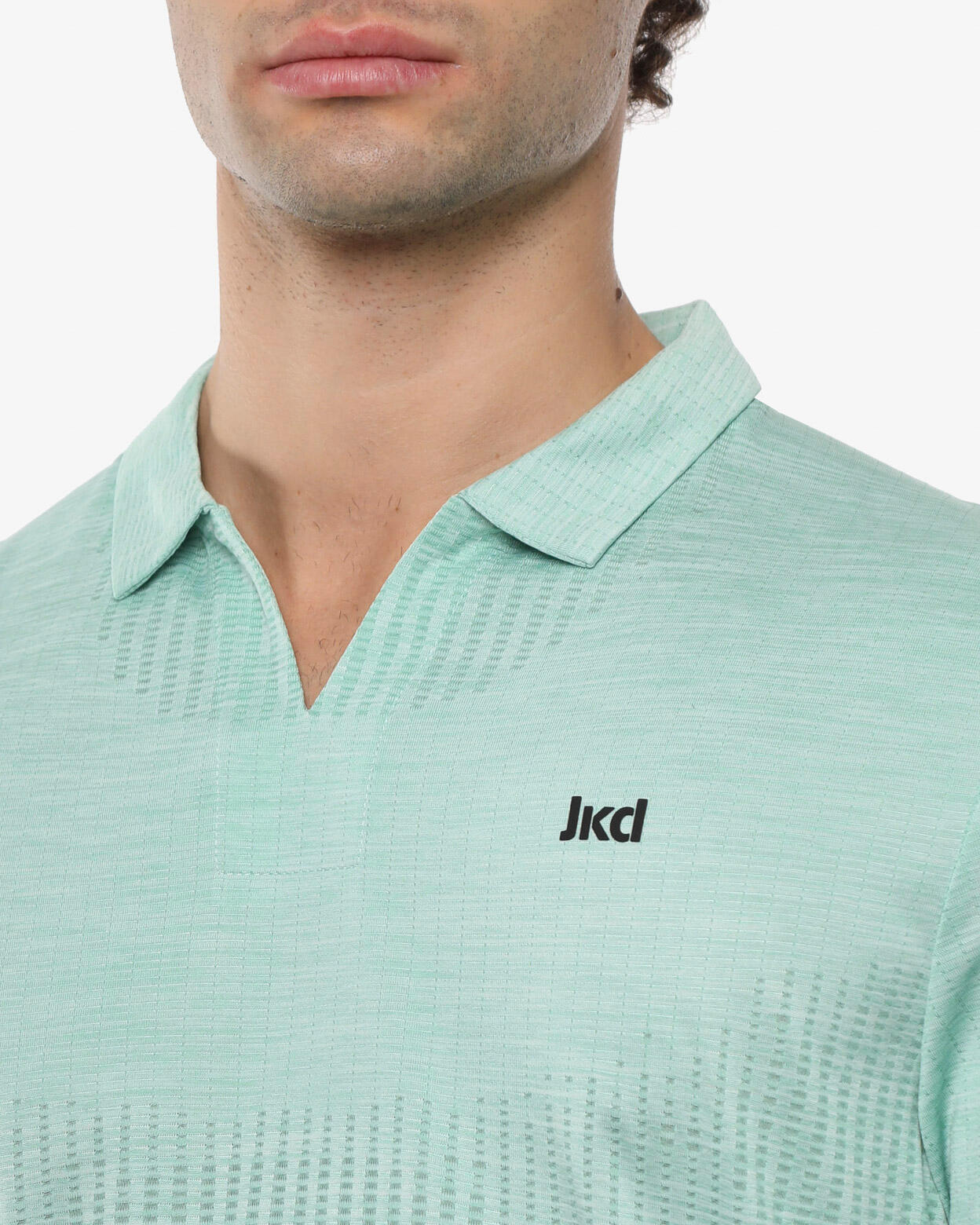 polo  menta da uomo in mat. sintetico da fitness 3/4