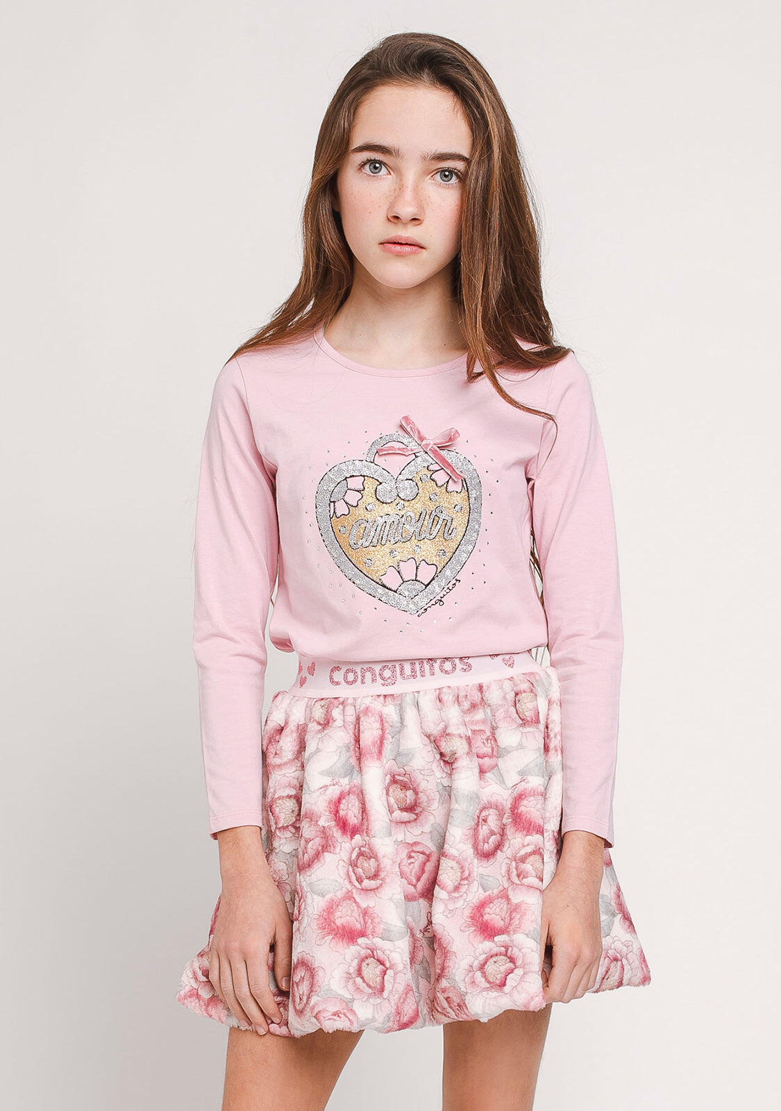 Falda de piel rosa para niña 2/3