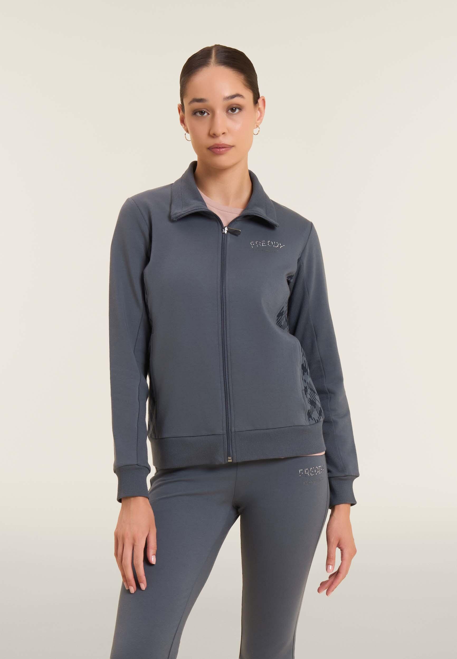 Felpa full zip con collo alto e inserti geometrici 2/4