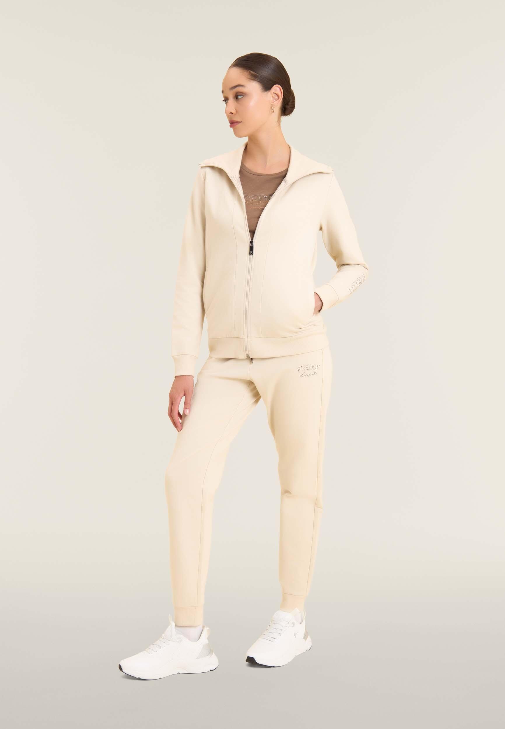Pantalon de sport caractérisé par un bord avec bandes aux chevilles et cordon 5/5